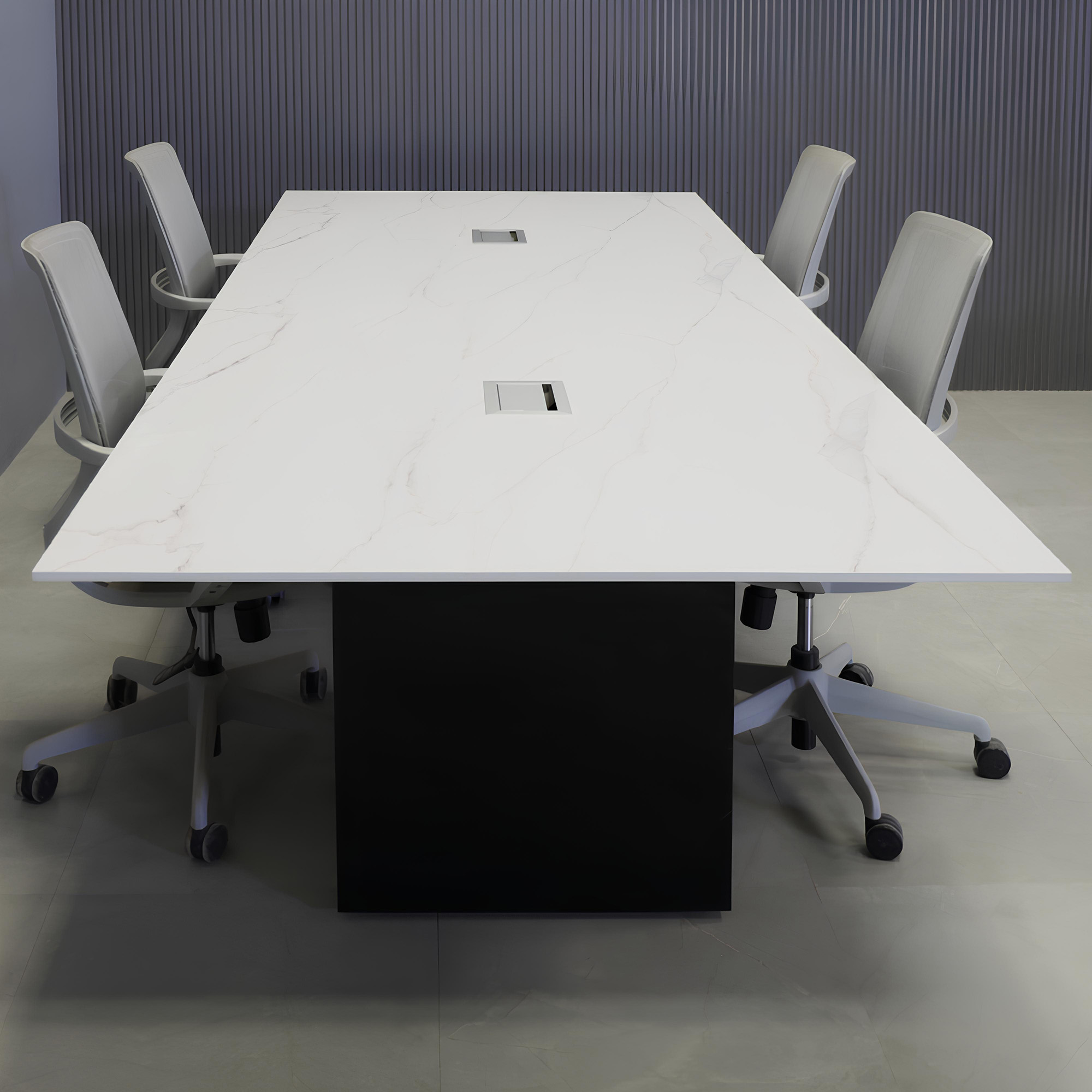 120-inch Aurora Rectangular Conference Table in 1/2-inch solenne marble engineered surface top, black matte laminate standard base, and two silver MX3 power boxes.