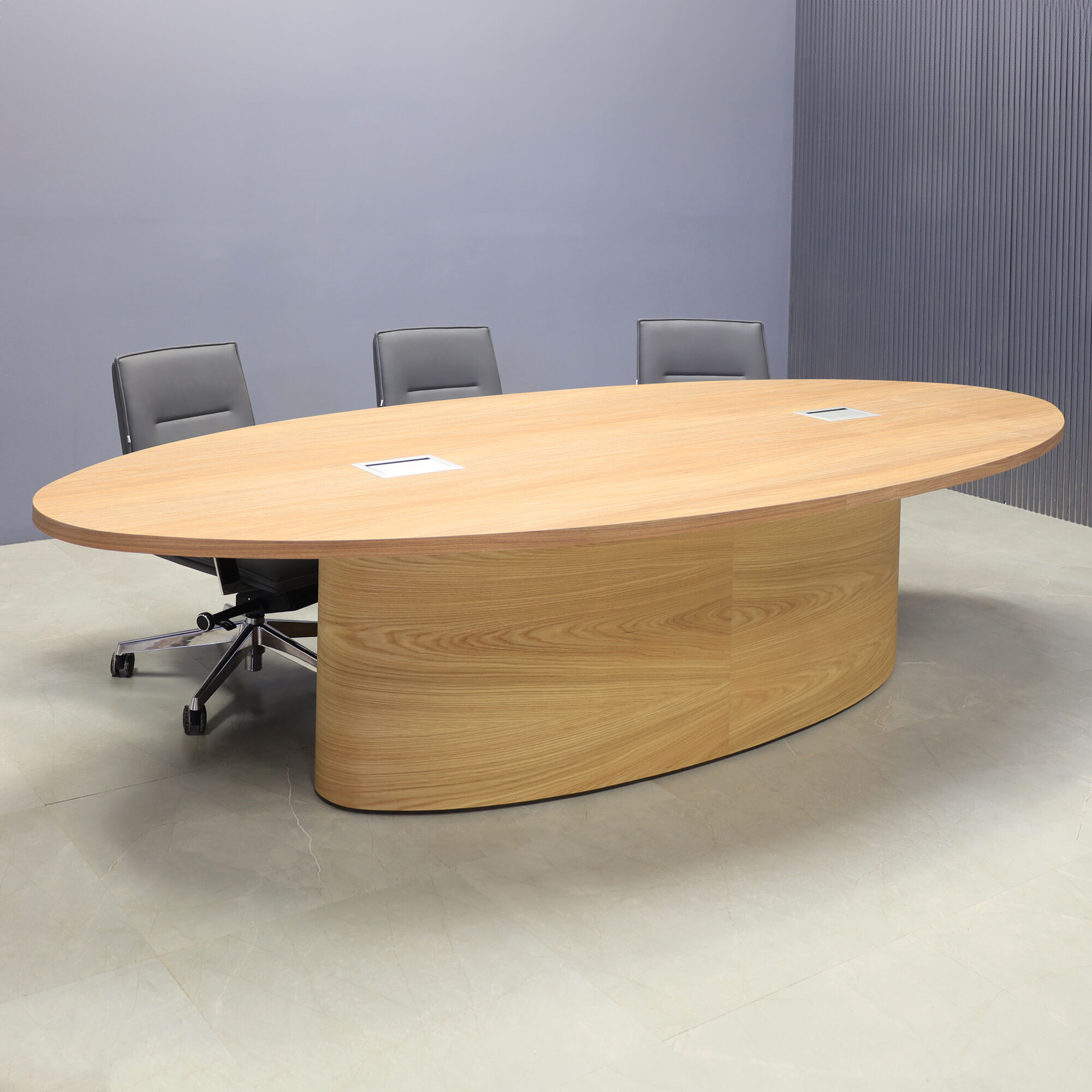 120-inch Newton Oval Conference Table with X2 base in white oak veneer finish (DISCONTINUED)  and two silver Mx3 power boxes.