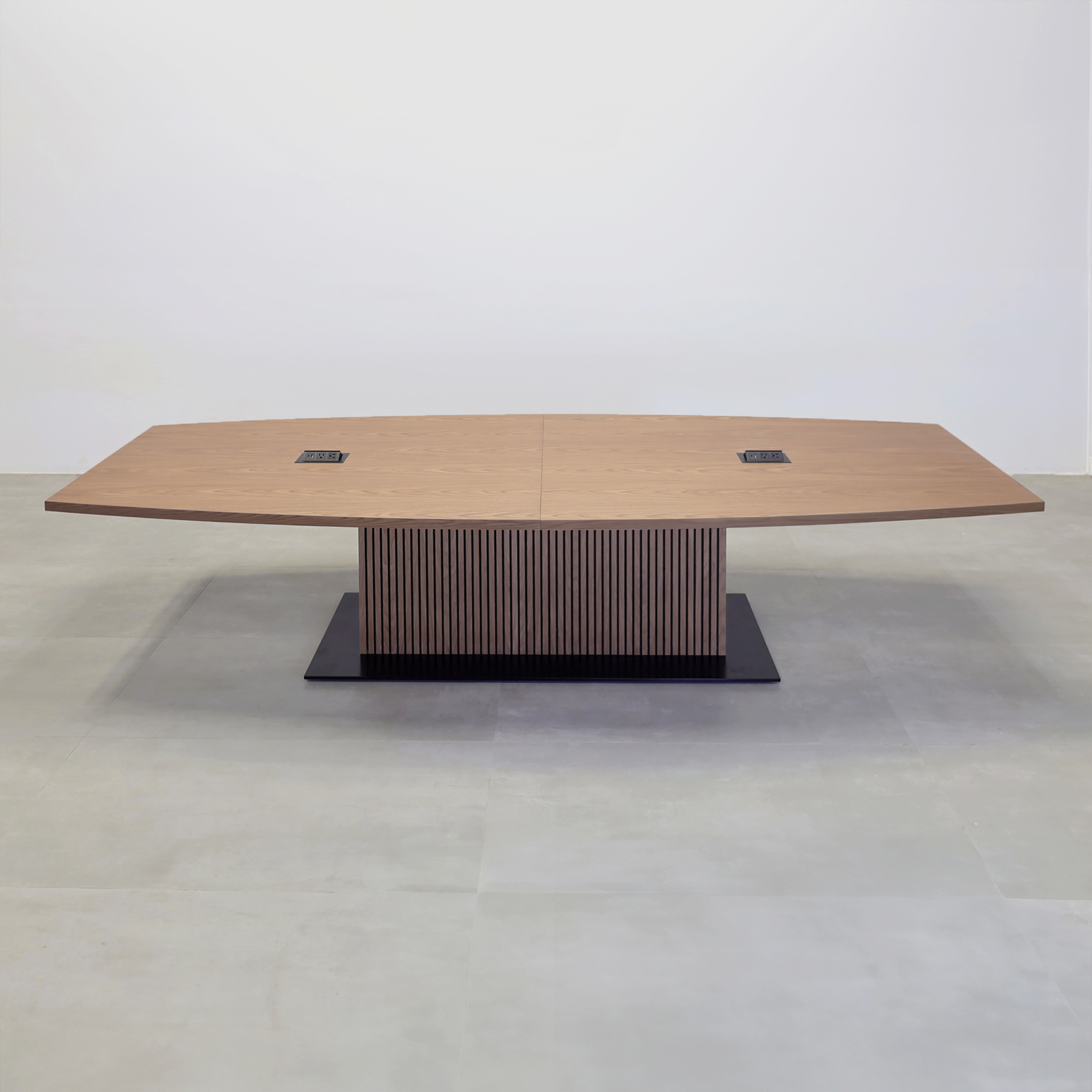 120-inch Newton Boat Conference Table with Laminate Top and X3 Base with walnut wood veneer top, walnut wood veneer tambour pedestal base, black matte laminate base, and mx2 power box in black.