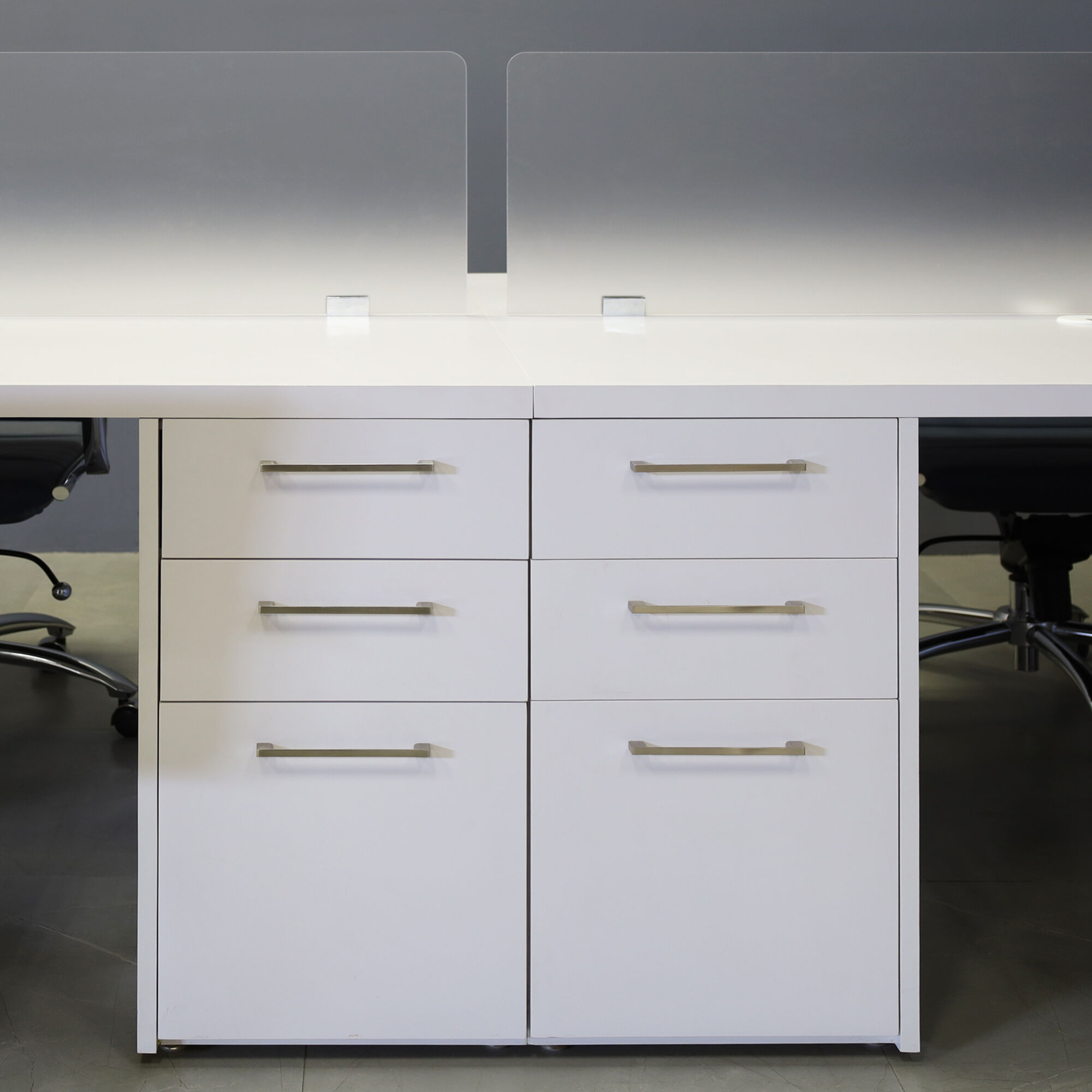 120-inch aXis Custom Workstation in white gloss laminate top, legs & storage, with two frosted acrylic partitions.