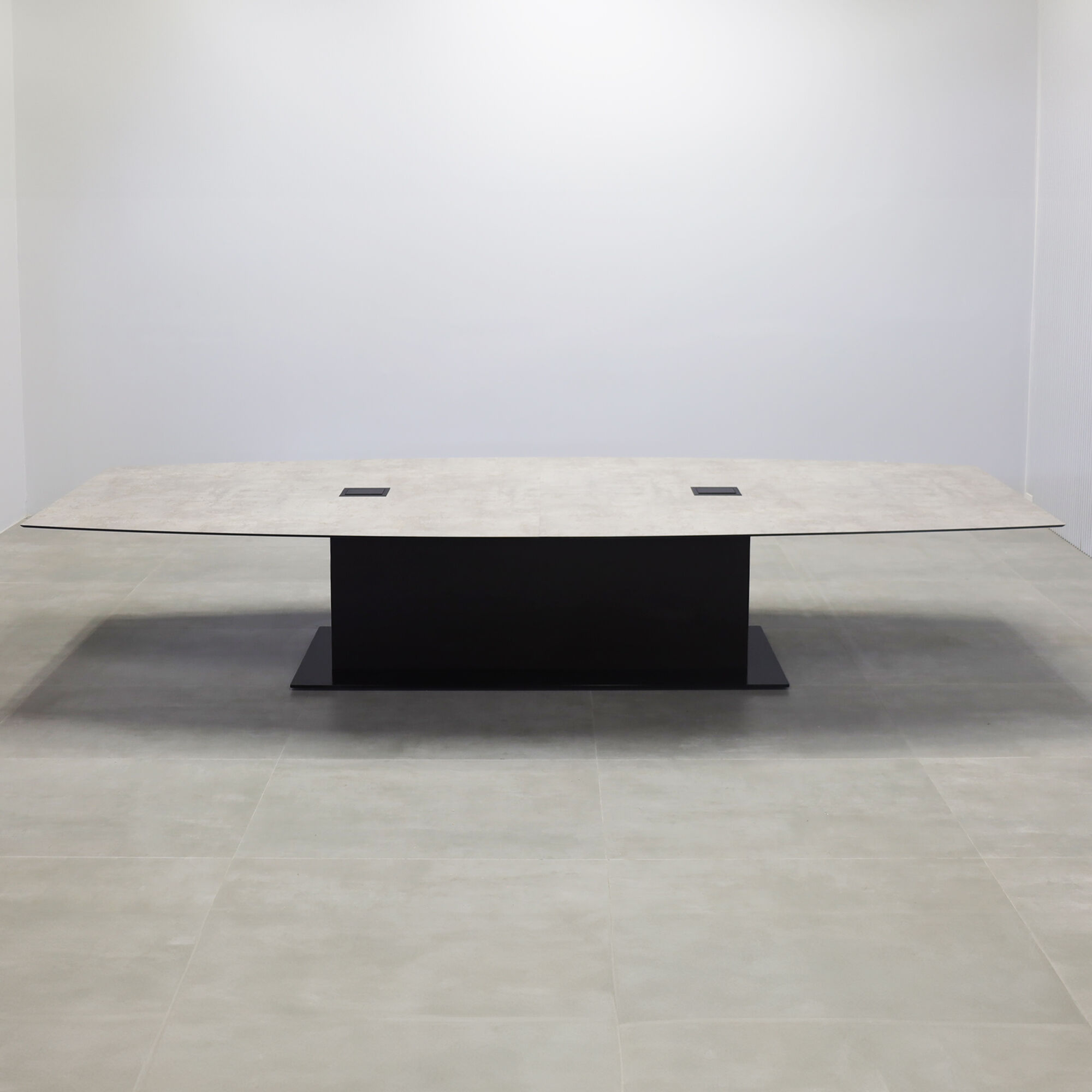 168-inches Aurora Boat Shape Conference Table with industrial concrete engineered surface top, and black traceless laminate X3 base.