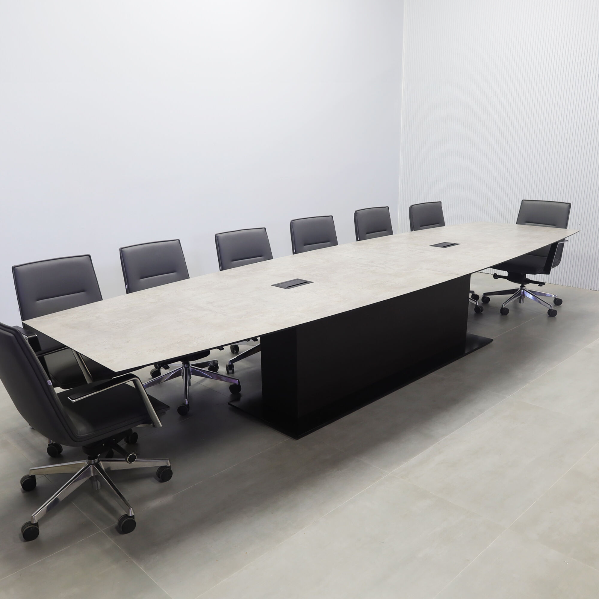 168-inches Aurora Boat Shape Conference Table with industrial concrete engineered surface top, and black traceless laminate X3 base.