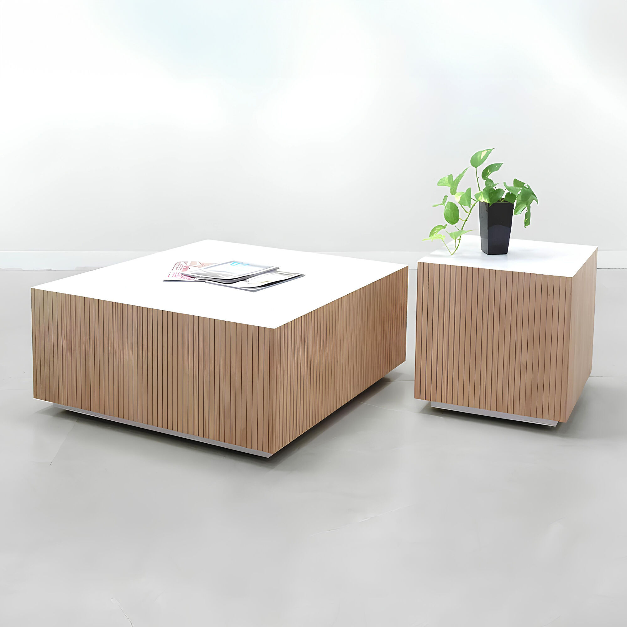 36-inch Norfolk Square Lobby Table with white matte laminate top and discontinued white oak tambour side table.