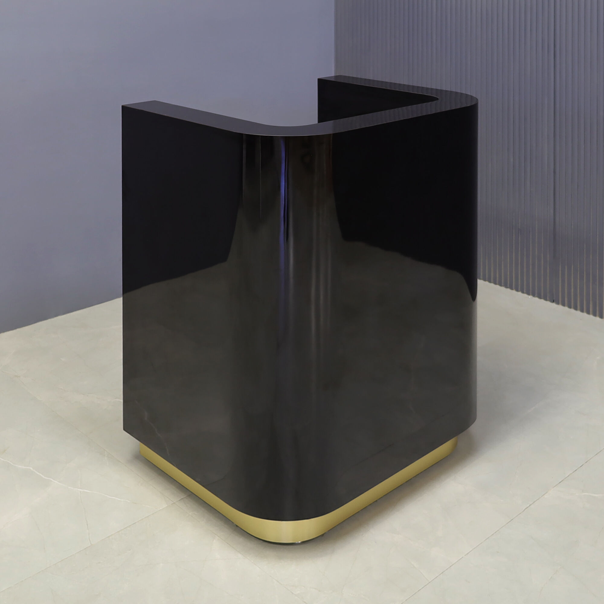 32-inch Nola Podium & Host Custom Desk in black gloss laminate main desk, and brushed gold toe-kick.