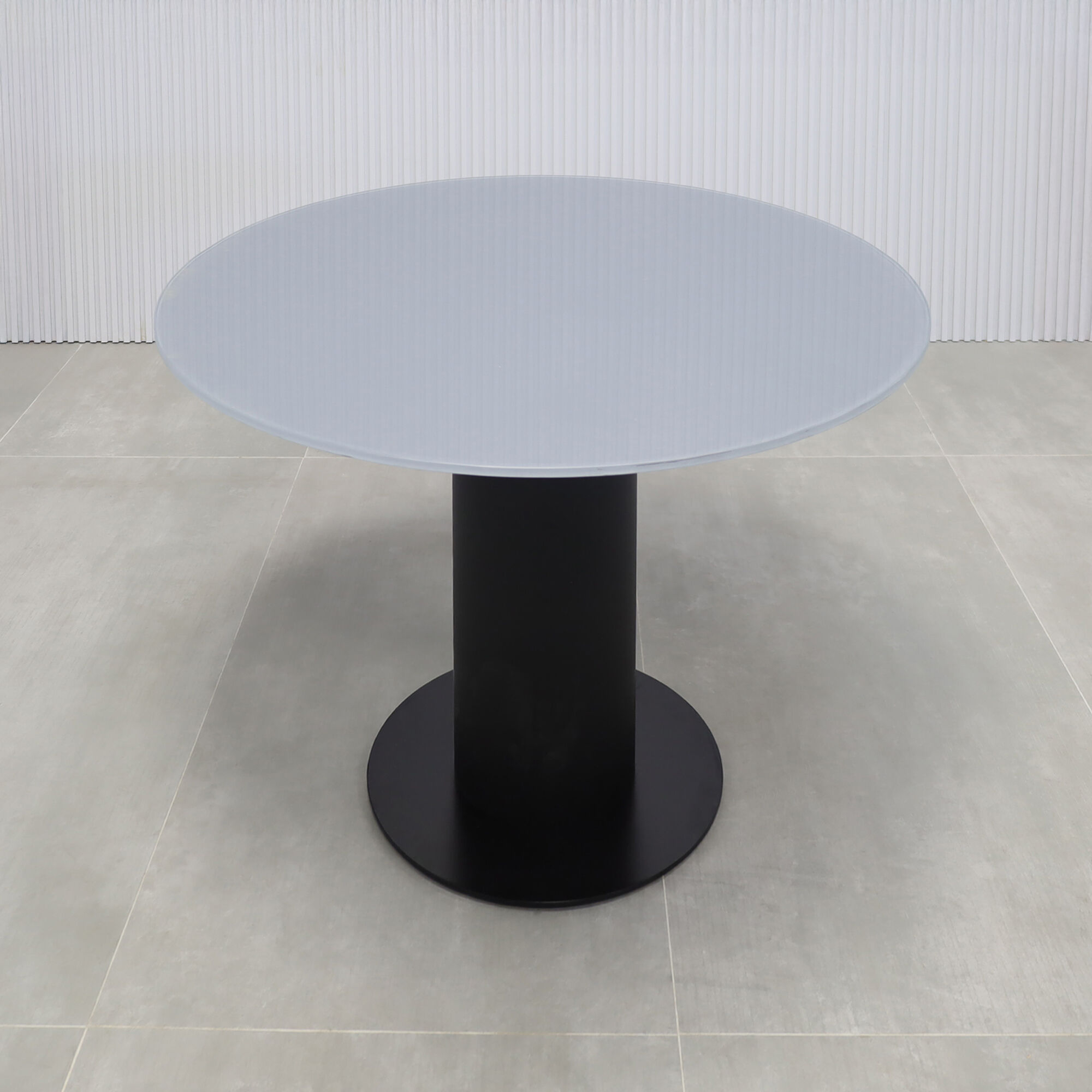 36-inch Omaha Round Conference Table with X3 Base in dark gray tempered glass top, black traceless laminate pedestal, and black stainless steel base.