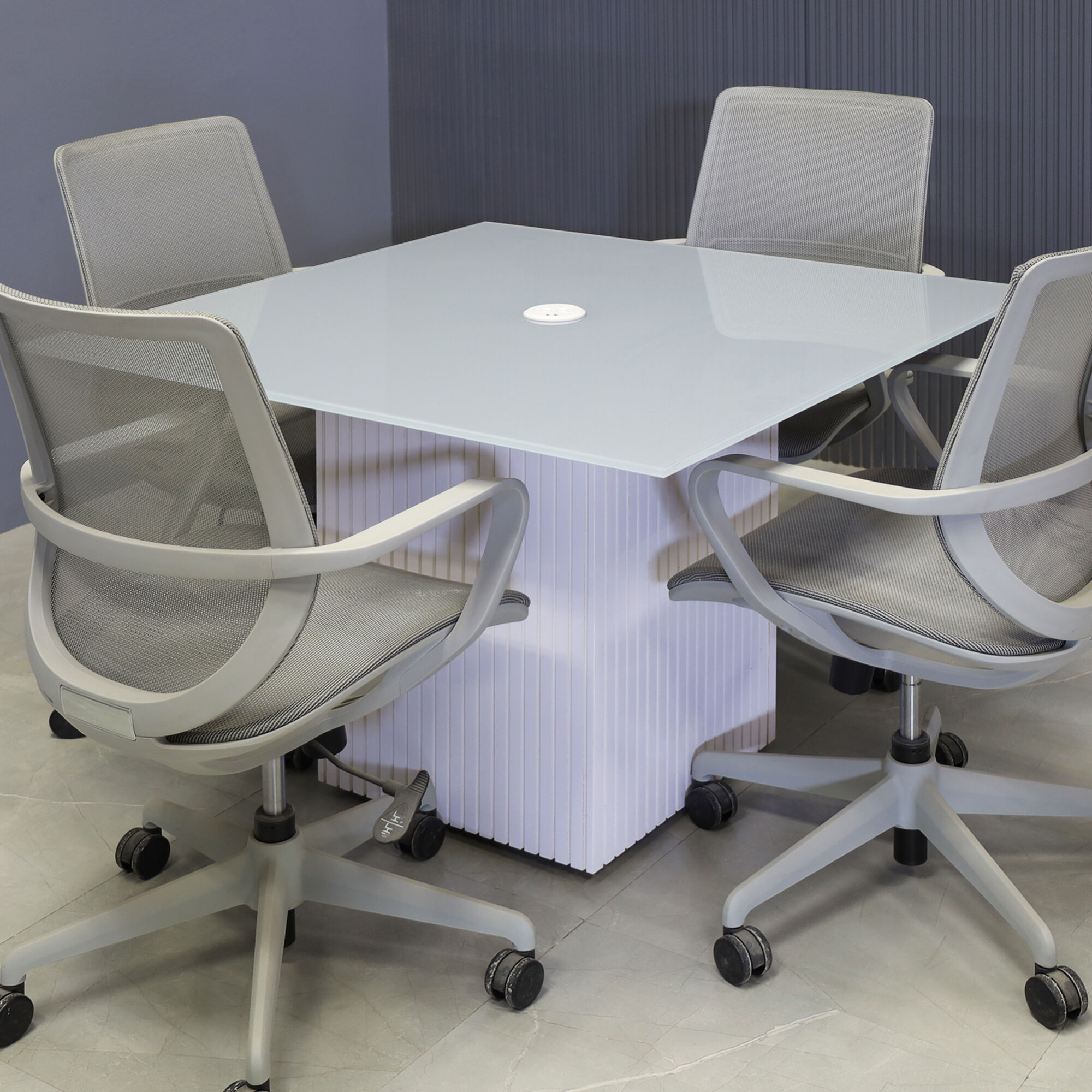 42-inch Omaha Square Shape Conference Table in 1/2-inch light gray tempered glass top with our white MX1 powerbox, and dover off-white gloss tambour base.