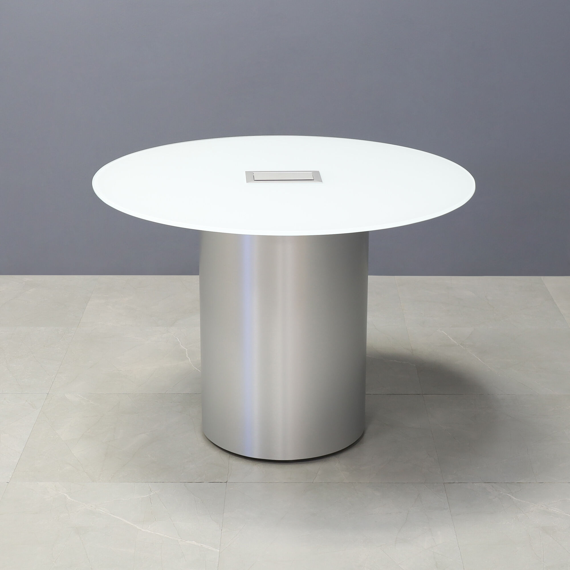 42-inch Omaha Round Conference Table in 1/2-inch white tempered glass top, and brushed aluminum base, with silver MX3 power box.
