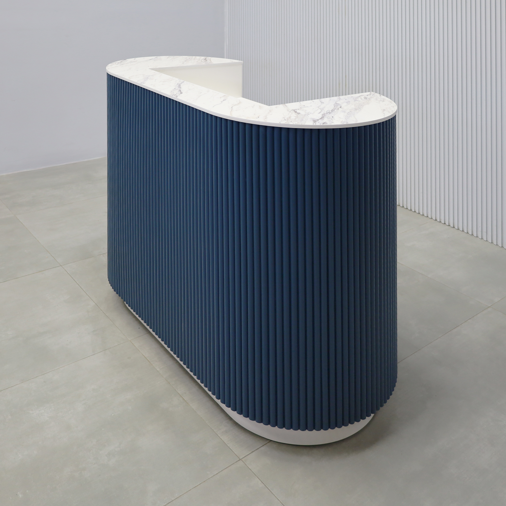 48-inch The Pill Podium Desk with Dover Off-White matte laminate workspace, hand-painted Sapphire CSP-690 Benjamin Moore solid wood tambour accent, and Dover Off-White matte laminate toe-kick.