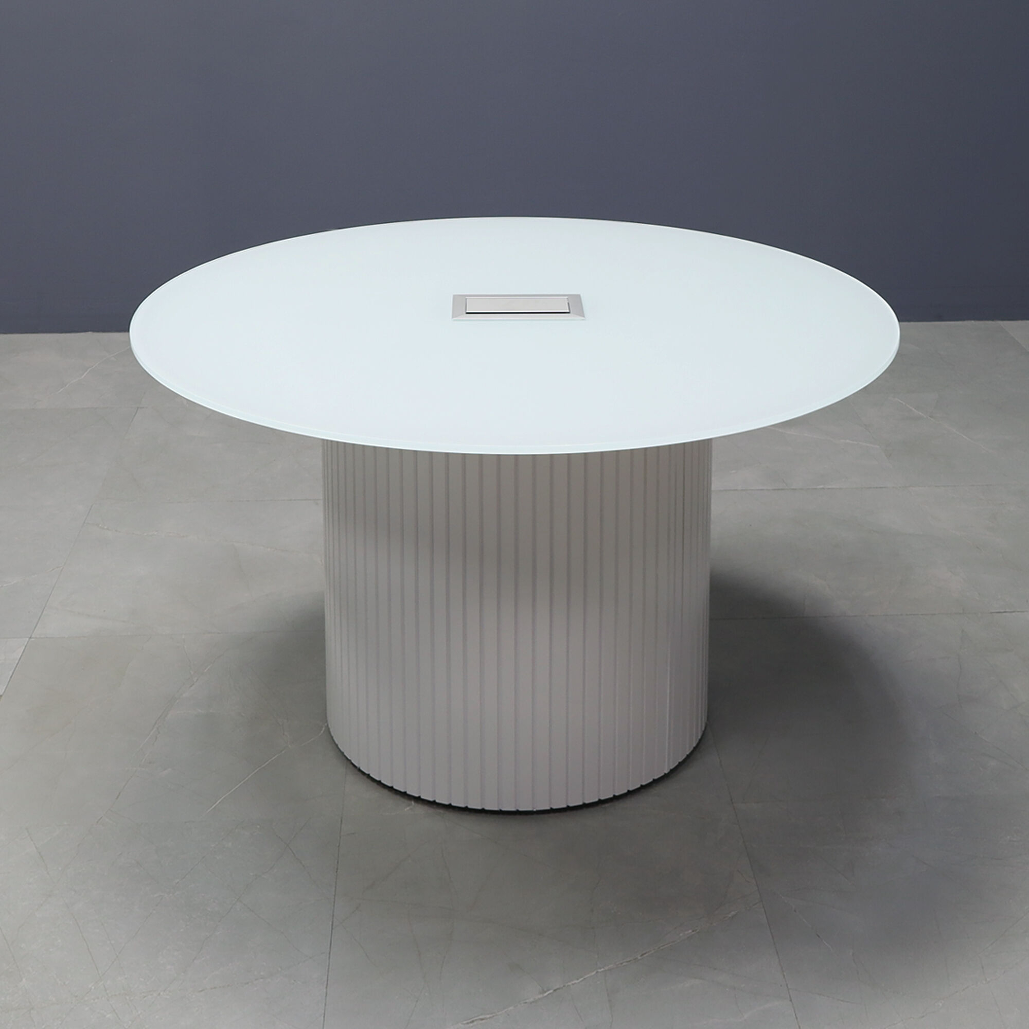 48-inch Omaha Round Conference Table in 1/2-inch white tempered glass top and white gloss tambour base, with silver MX3 power box.