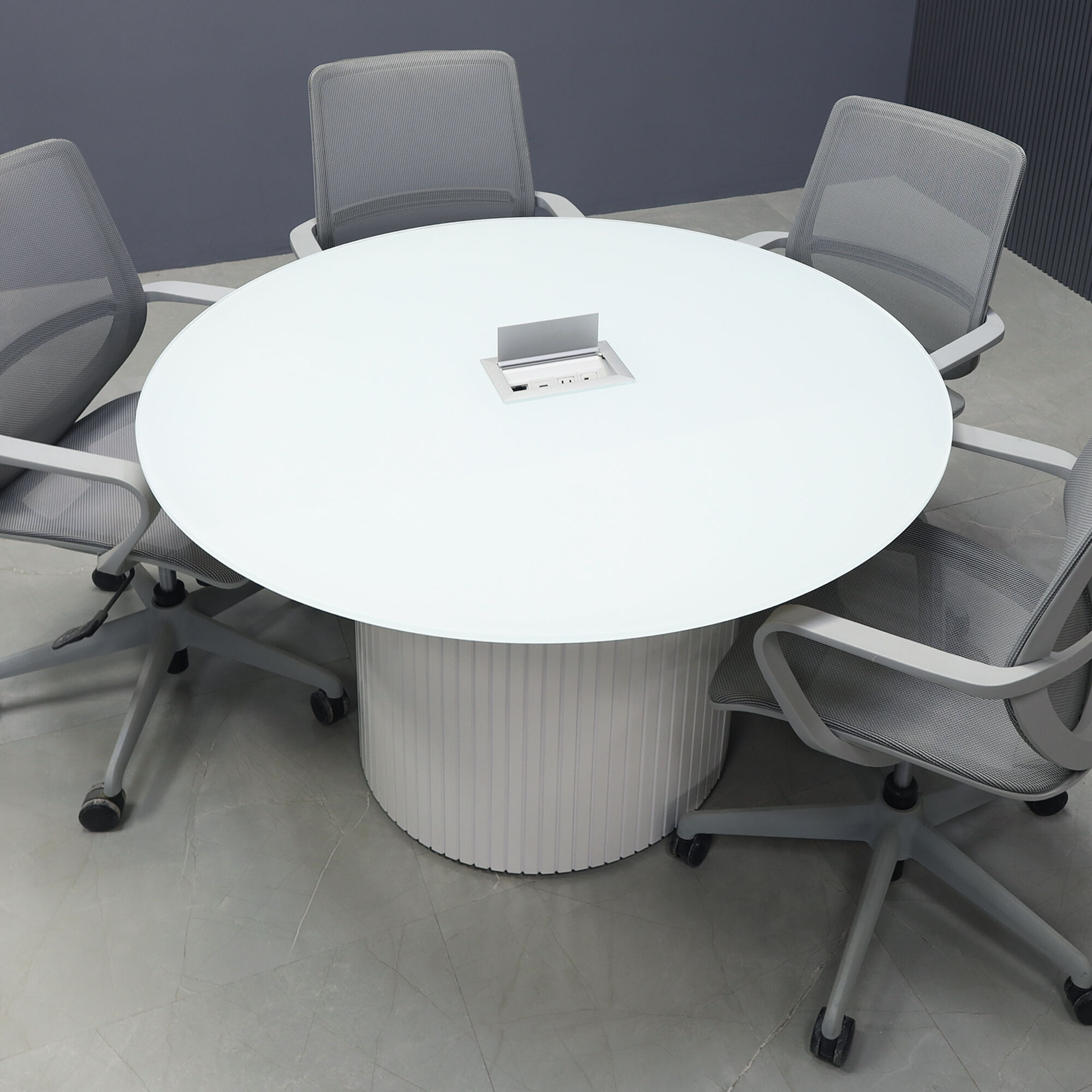 48-inch Omaha Round Conference Table in 1/2-inch white tempered glass top and white gloss tambour base, with silver MX3 power box.