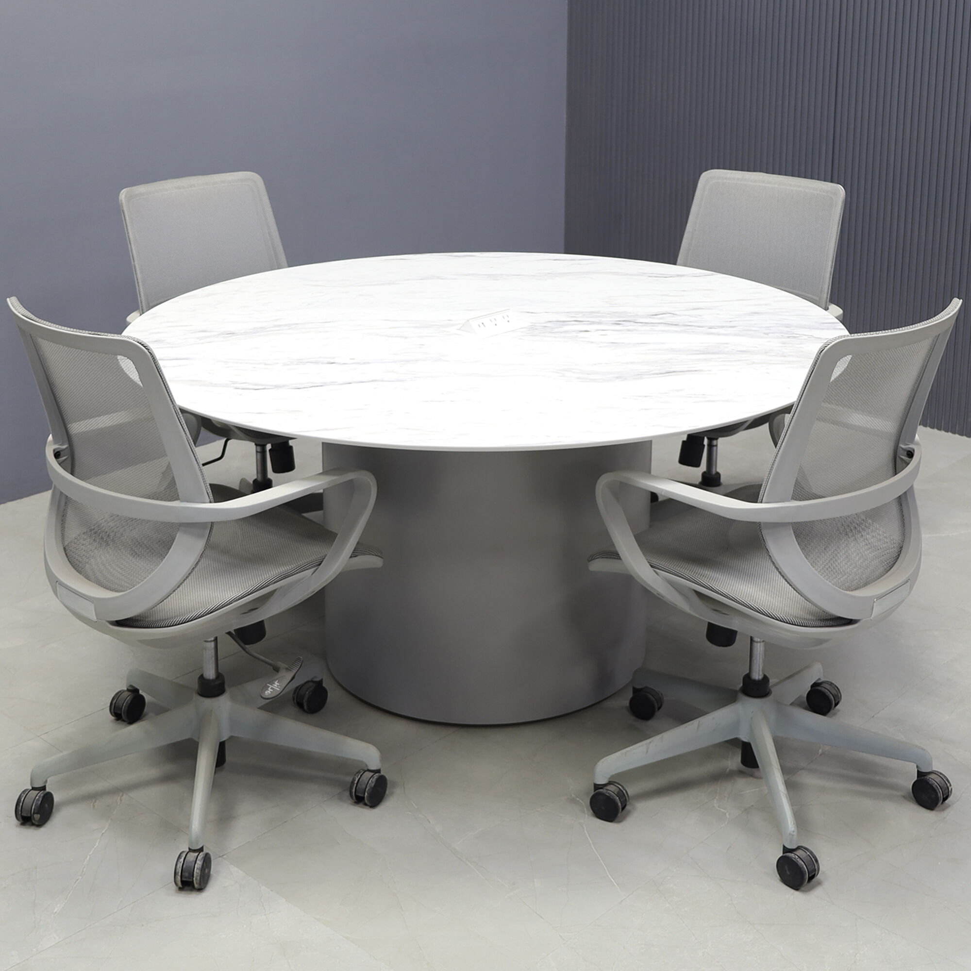 54-inch Aurora Round Conference Table in 1/2-inch calcutta blanc engineered surface top, fog gray matte laminate base, and white MX2 power box.
