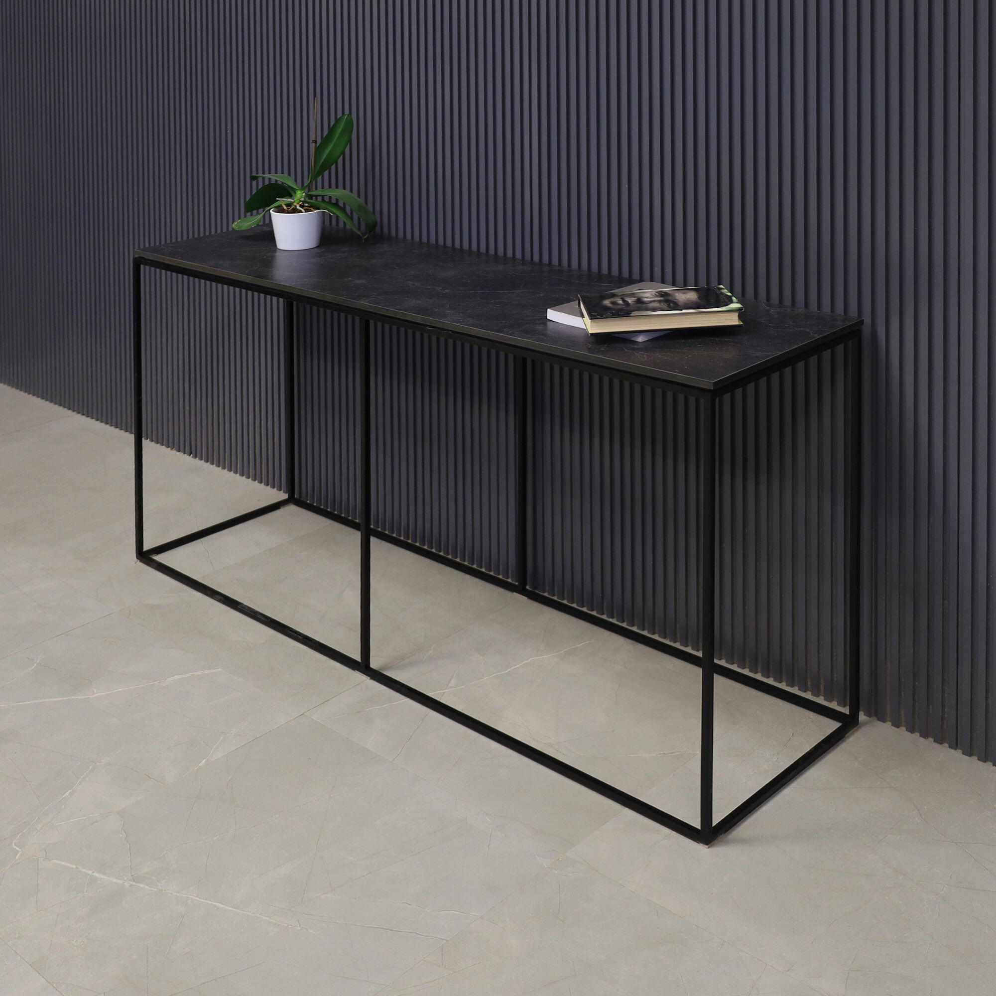 60-inch Aspen Console Table in 1/2-inch black amani engineered surface top and black metal frame.