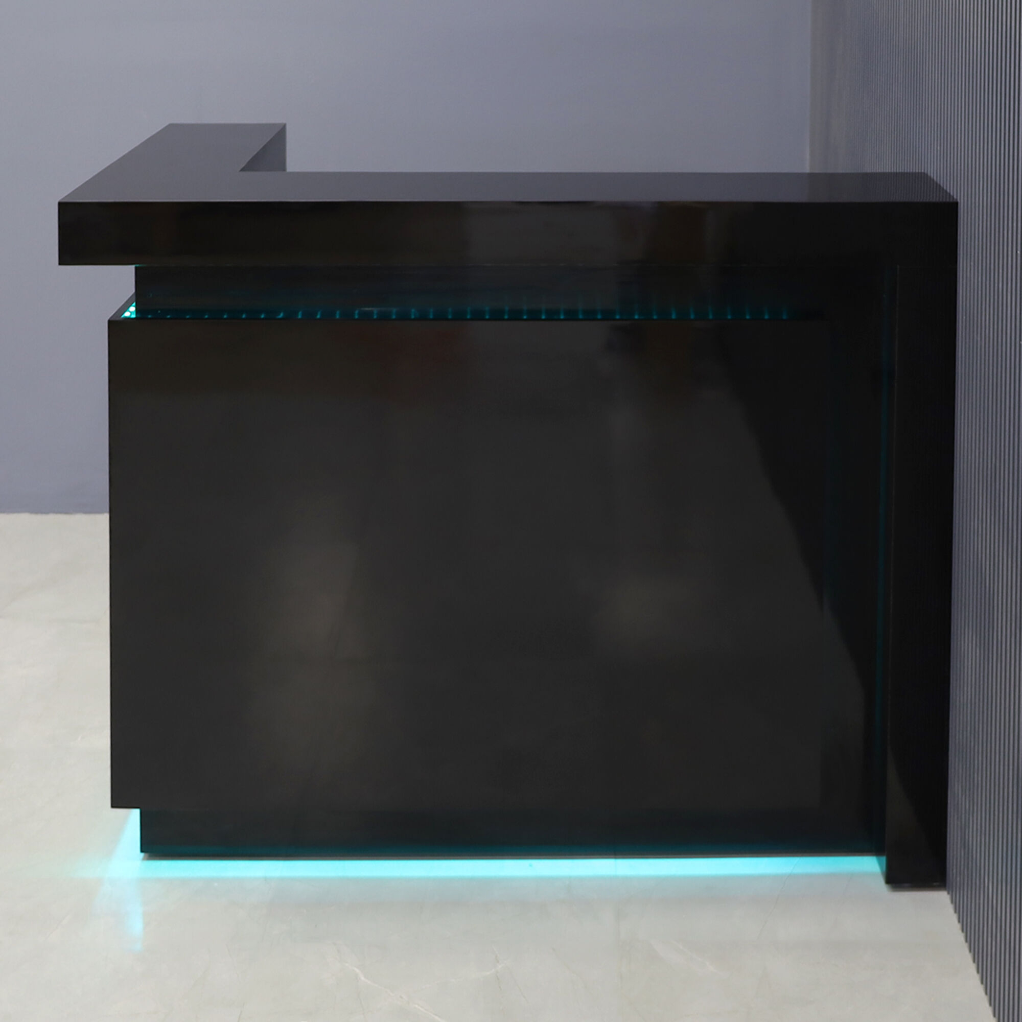 60-inch New York L-Shape Custom Reception Desk, left side l-panel when facing front, in black gloss laminate desk, with color LED, shown here.