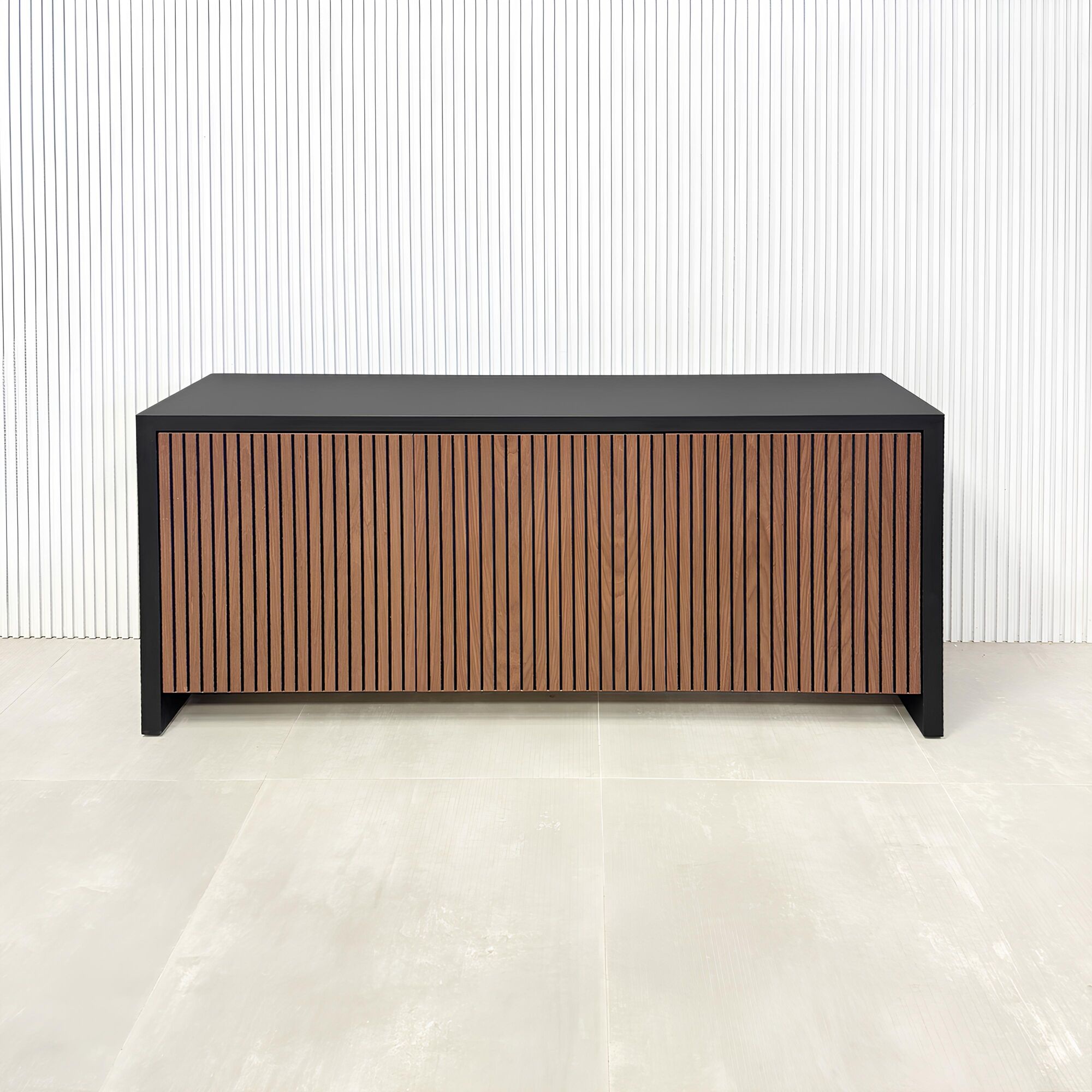 60-inch Boston Storage Credenza with black traceless laminate main body and walnut tambour with black background doors and push-to-open mechanism.