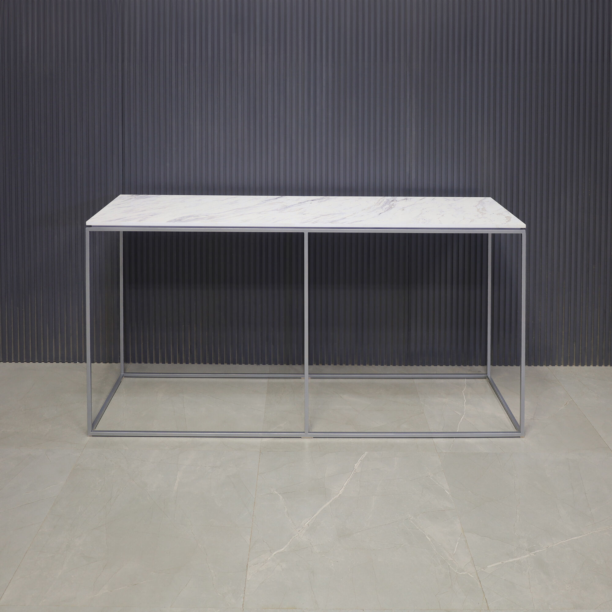 60-inch Aspen Console Table in 1/2" calcutta blanc engineered surface top and silver metal frame, shown here.