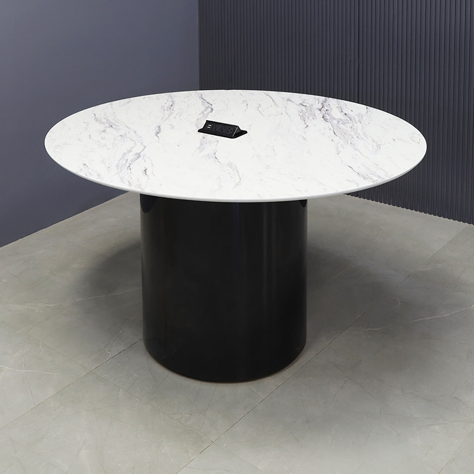 60-inch Aurora Oval Conference Table in 1/2-inch calcutta blanc engineered surface top, black gloss laminate base, and black power box.