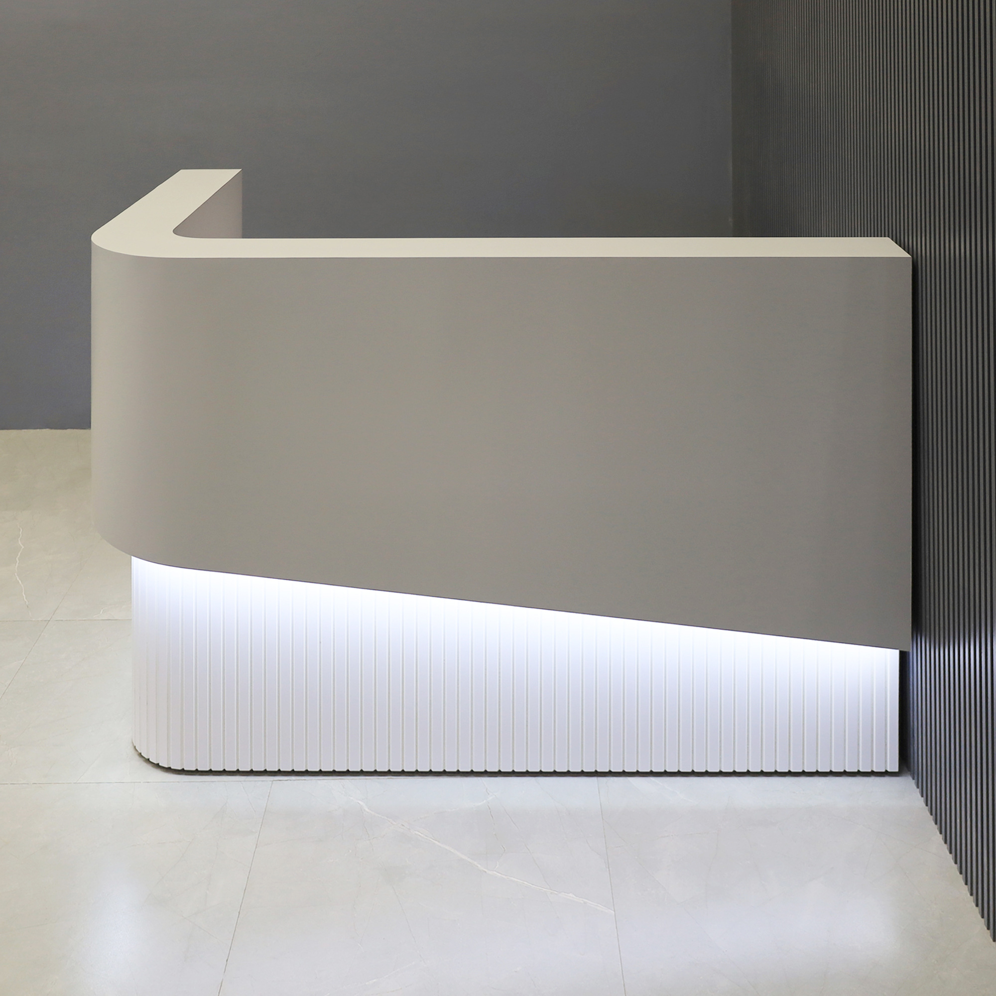 60-inch Nola L-Shape Curved Custom Reception Desk in folkstone gray matte laminate counter, white matte tambour fornt desk and white matte laminate workspace, with white LED, shown here.