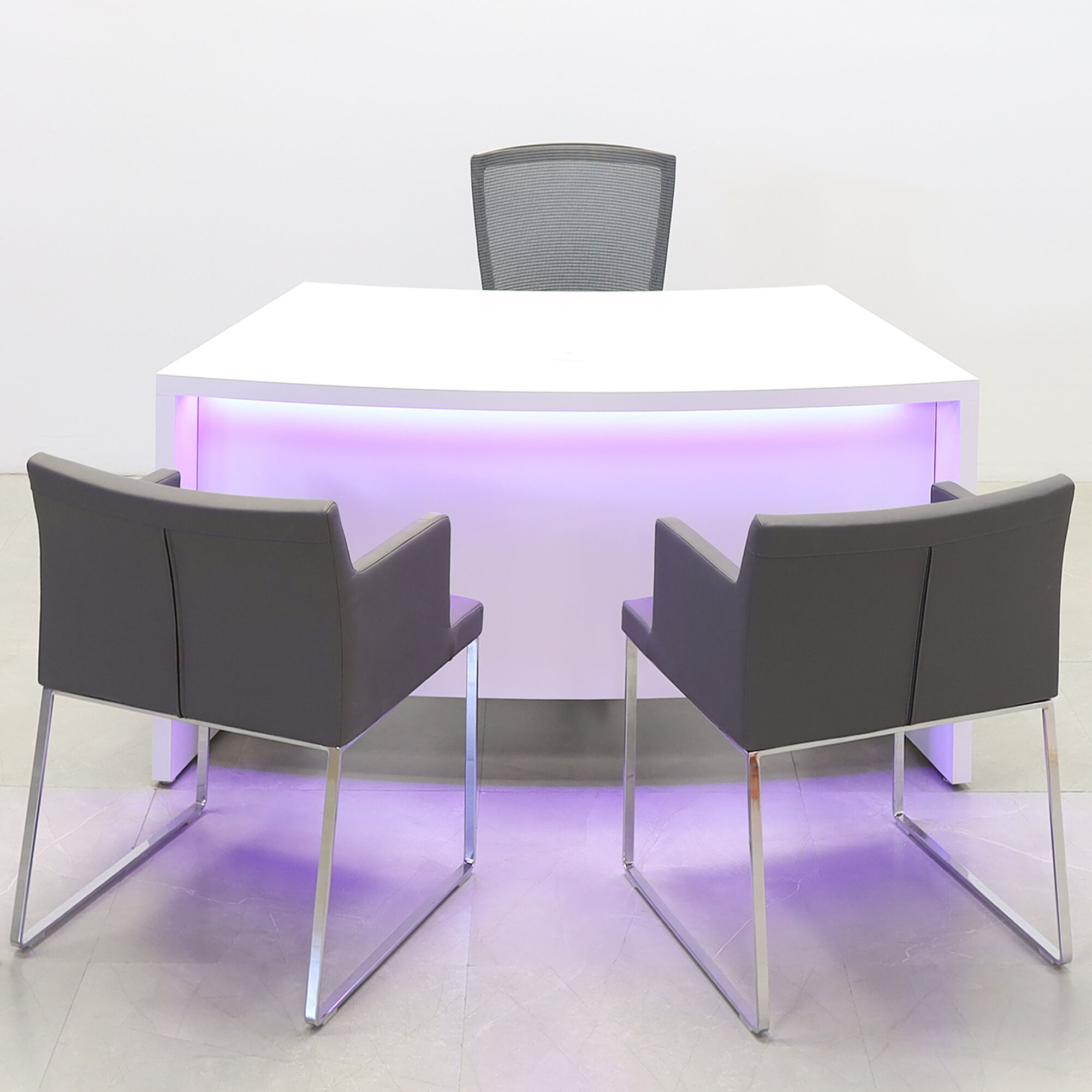 60-inch Seattle Curved Executive Desk in white matte laminate main desk & front panel, with color LED, shown here.