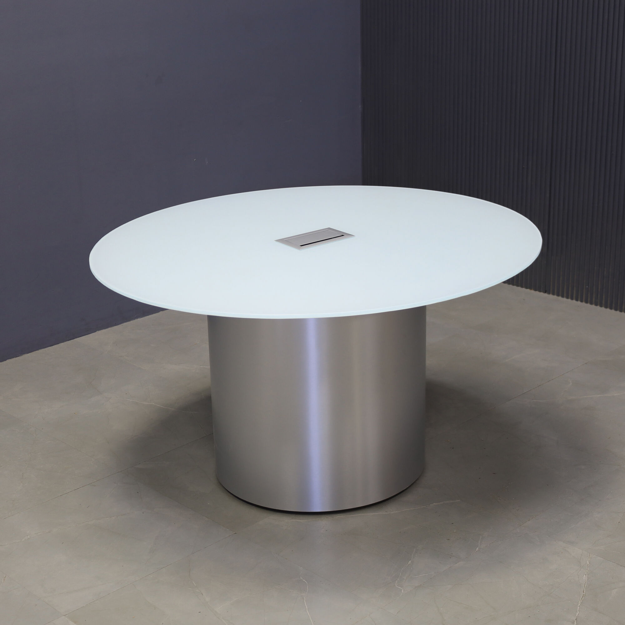 60-inch Omaha Round Conference Table in 1/2-inch white tempered glass top, and brushed aluminum base, with silver MX3 power box.