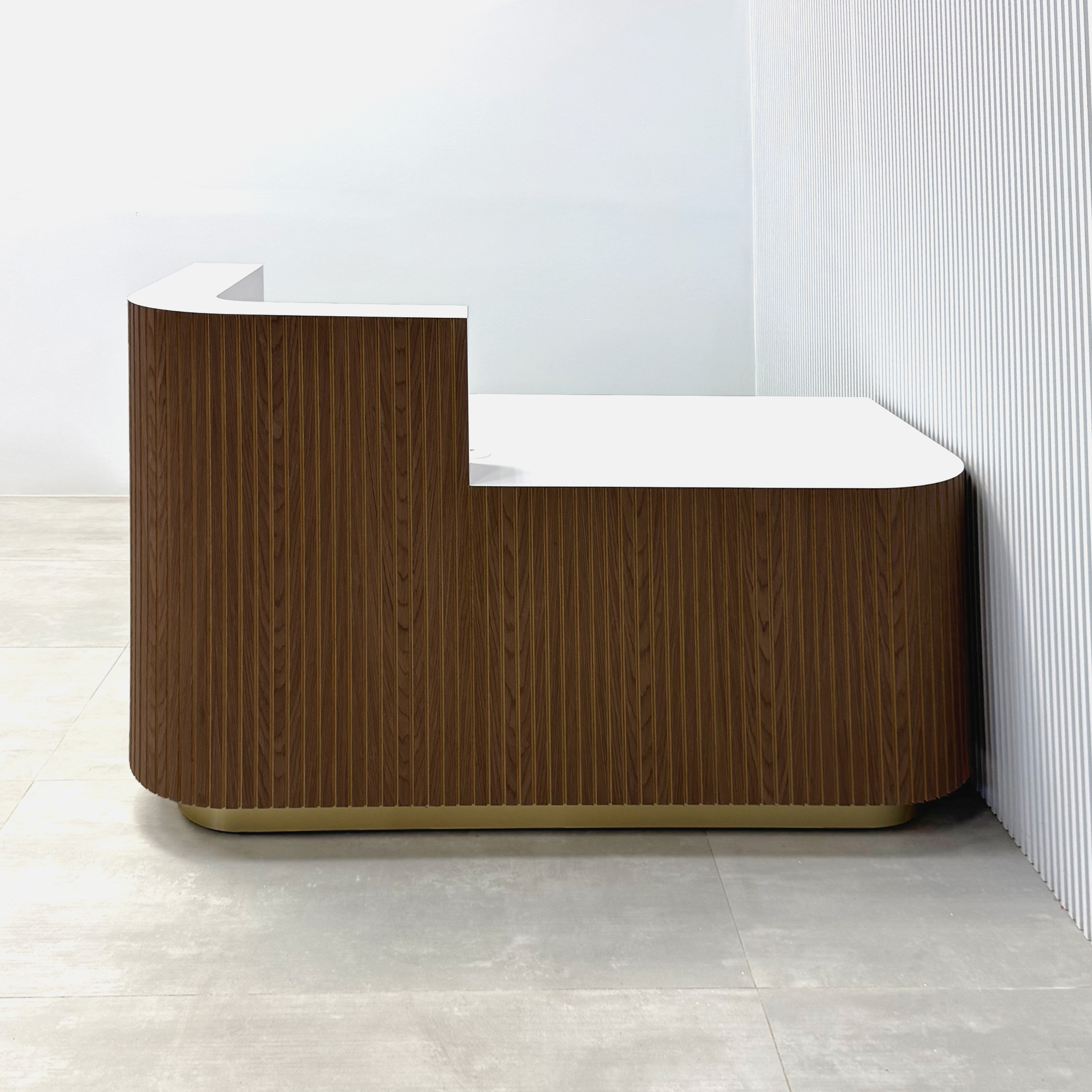 60-inch Nola Low Counter Reception Desk with Walnut & Natural background tambour main desk, White matte laminate workspace & storage, gold aluminum toe-kick, colored LED.