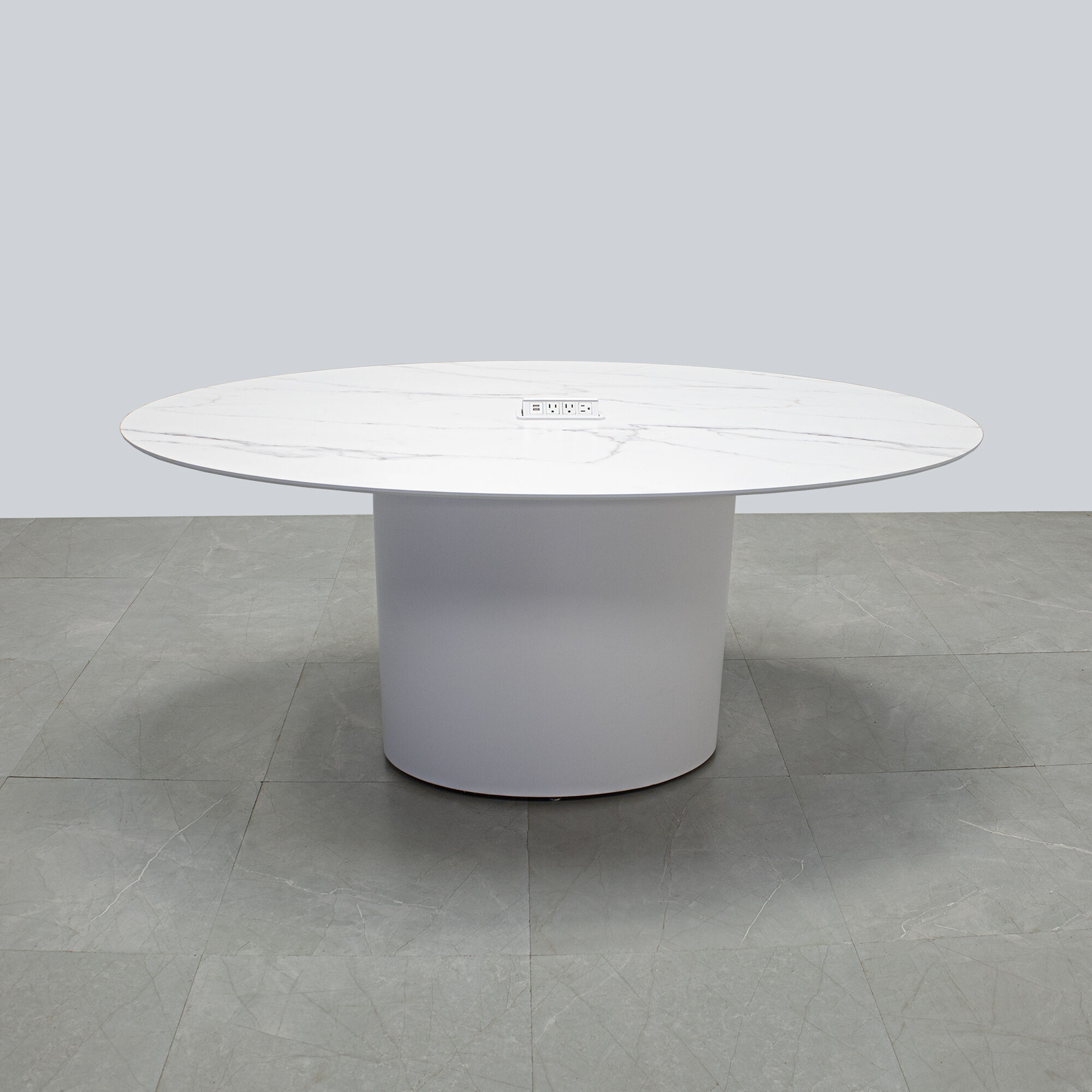 72-inch Aurora Oval Conference Table in 1/2-inch solenne marble engineered surface top, white matte laminate base, and white power box.