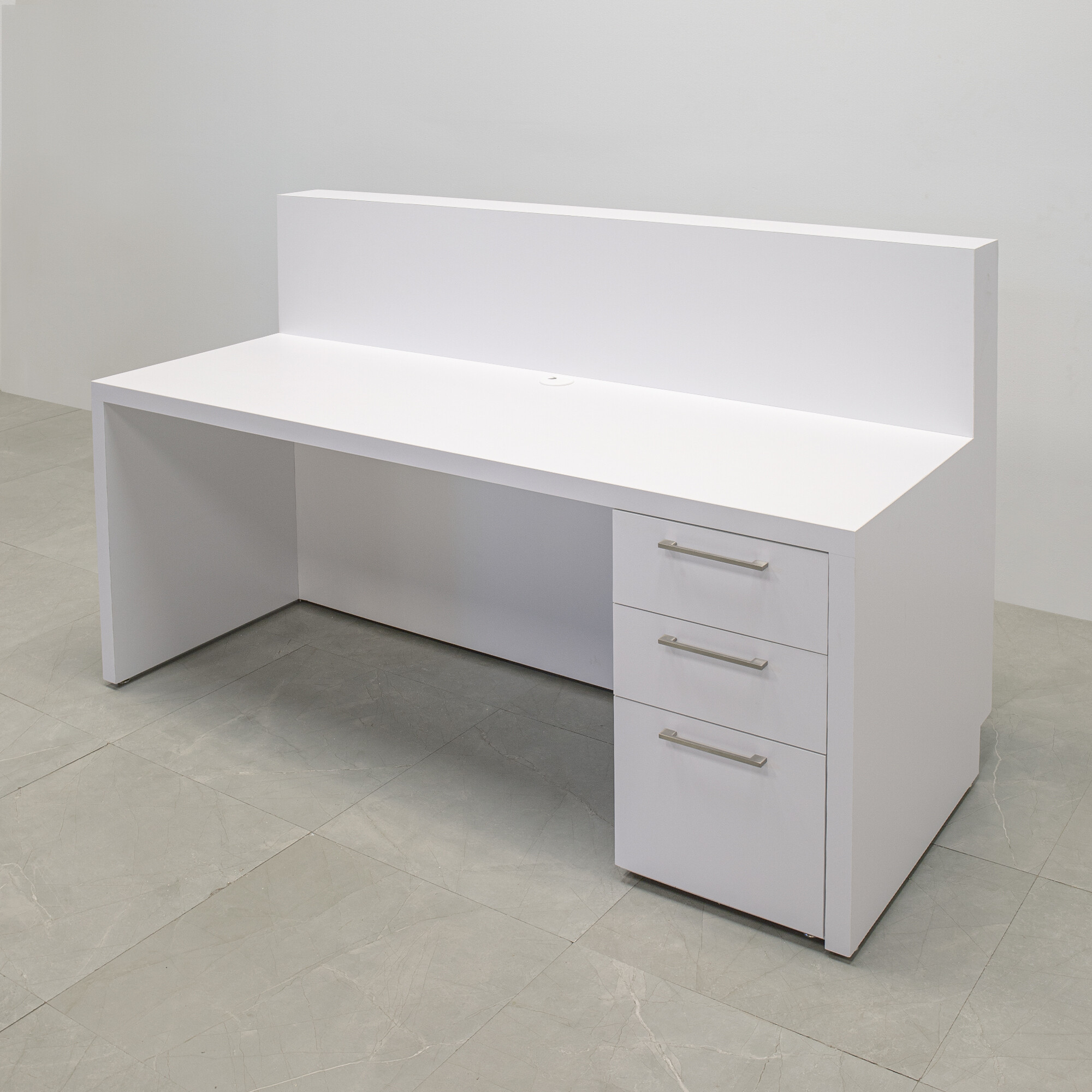 72-inch Dallas Straight Custom Reception Desk in white matte laminate main desk, and brushed aluminum toe-kick. Built-in storage on the right side when sitting.