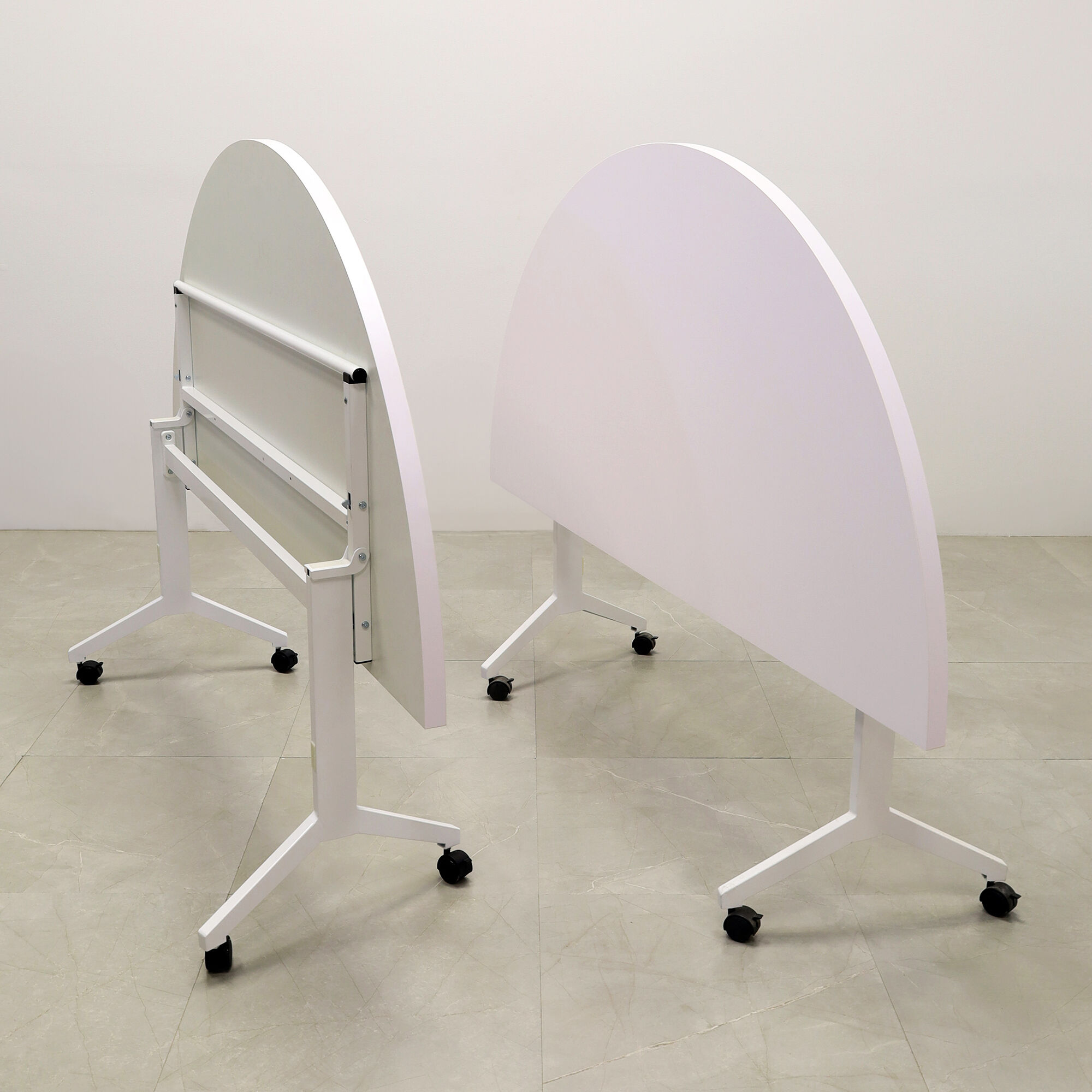Two 72-inch Westin Half Moon Training Table in white matte laminate top and white metal frame.