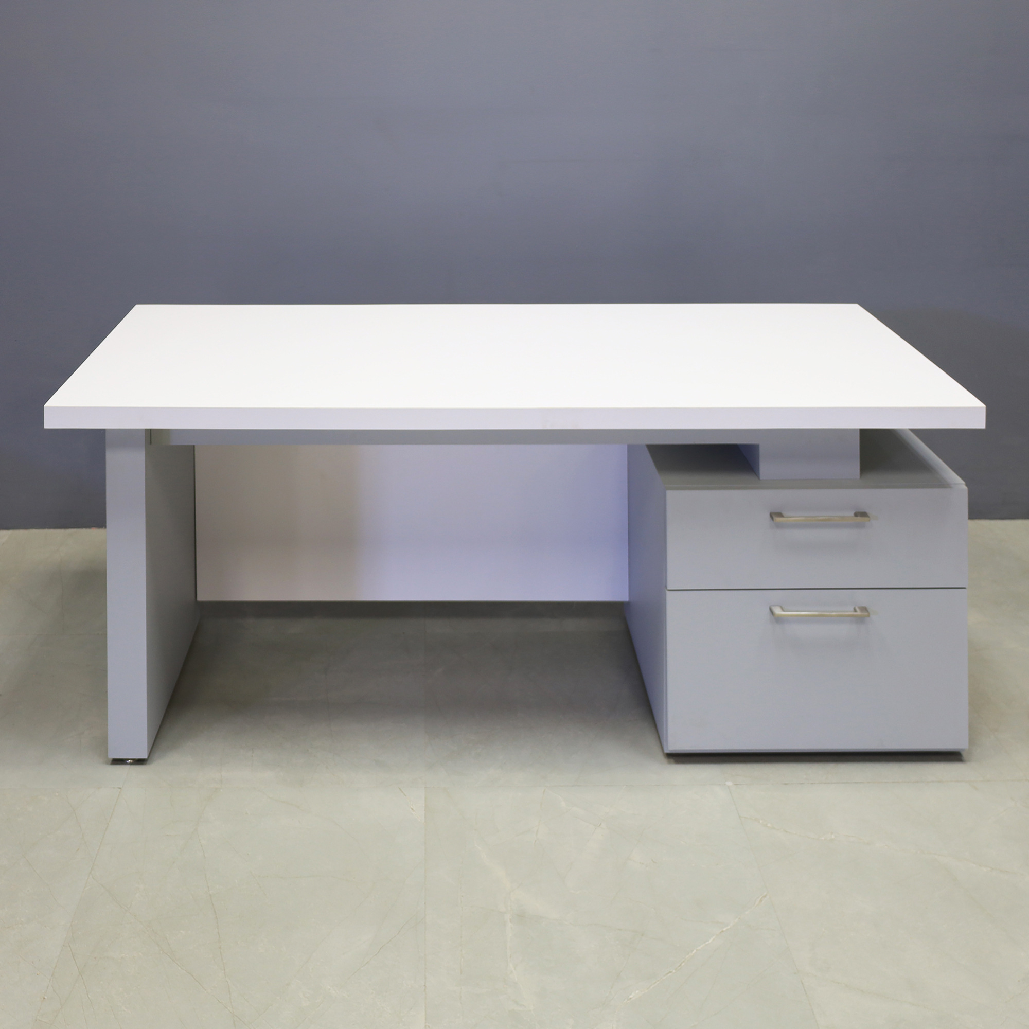 72-inch Avenue Straight Executive Desk with cabinet on the right side when sitting, with white matte laminate top & privacy panel, and fog gray matte laminate base & cabinet, shown here.