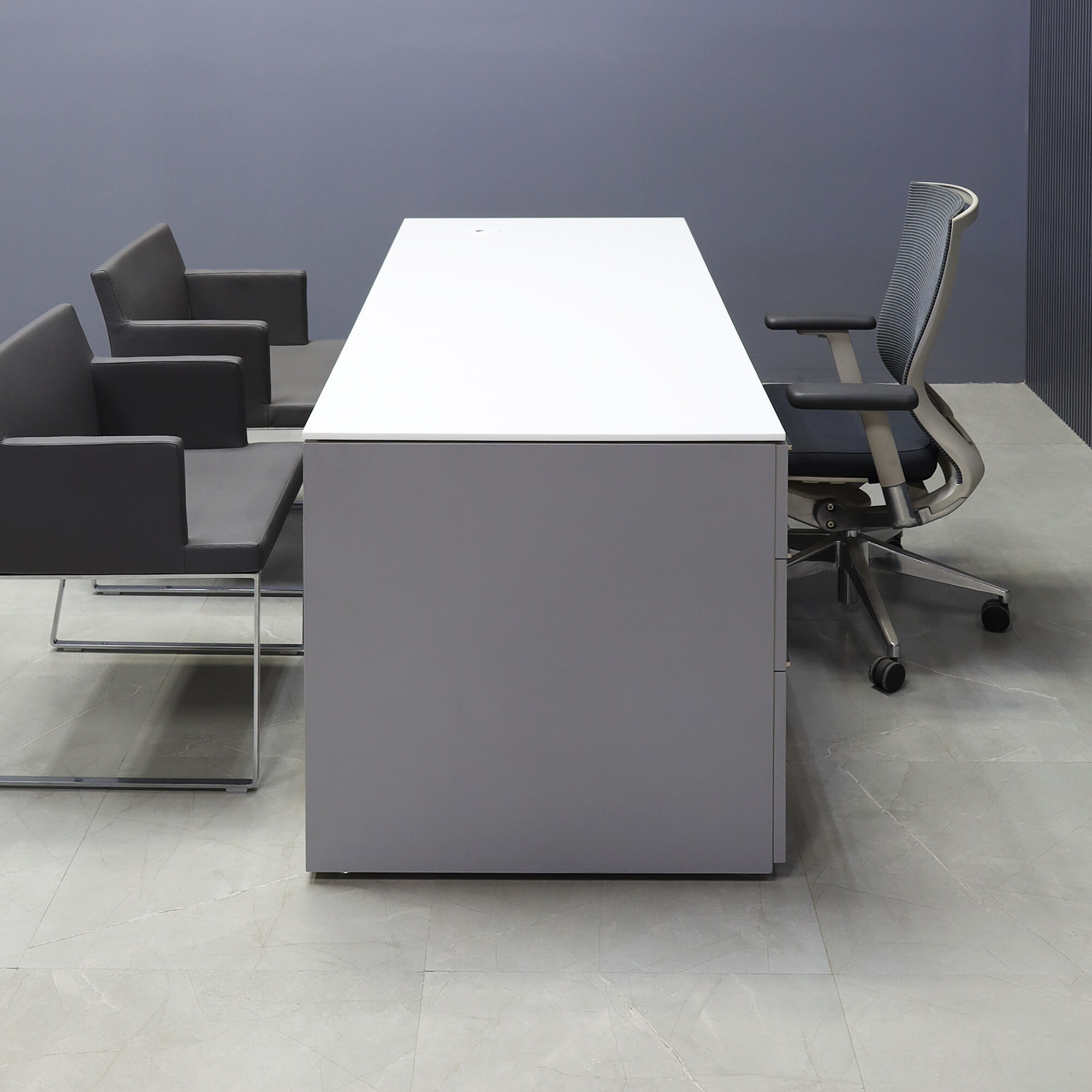 72-inch Denver Straight Executive Desk with cabinet on left side when sitting, in 1/2" white solid engineered surface top, and fog gray laminate base, storage & privacy panel, shown here.