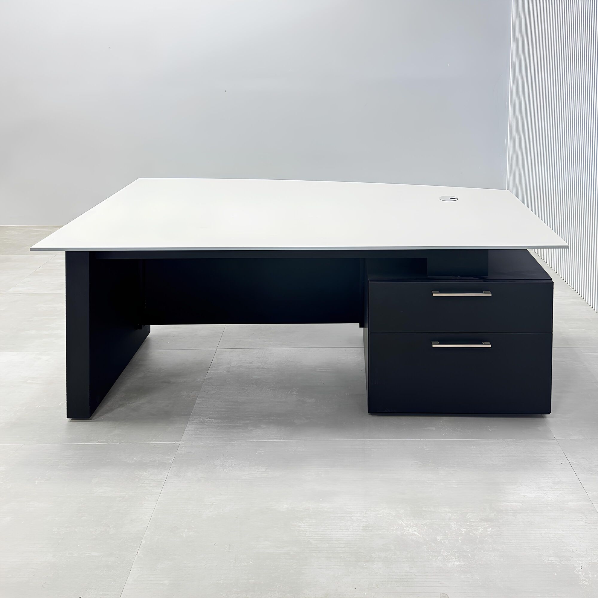 Avenue Straight Executive Desk with light gray traceless engineered surface top, black traceless laminate base & cabinet, and black traceless laminate privacy panel.