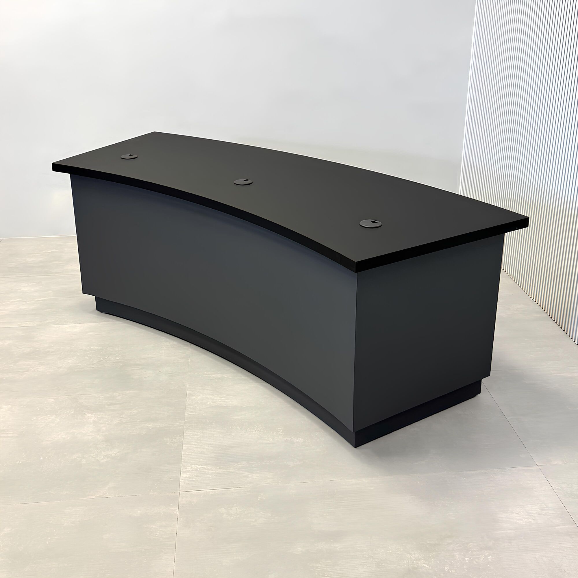 84-inch Seattle Custom Podcast Table with black tracless laminate top, dark gray traceless laminate front base, black matte laminate back base, and dark gray traceless laminate toe-kick.