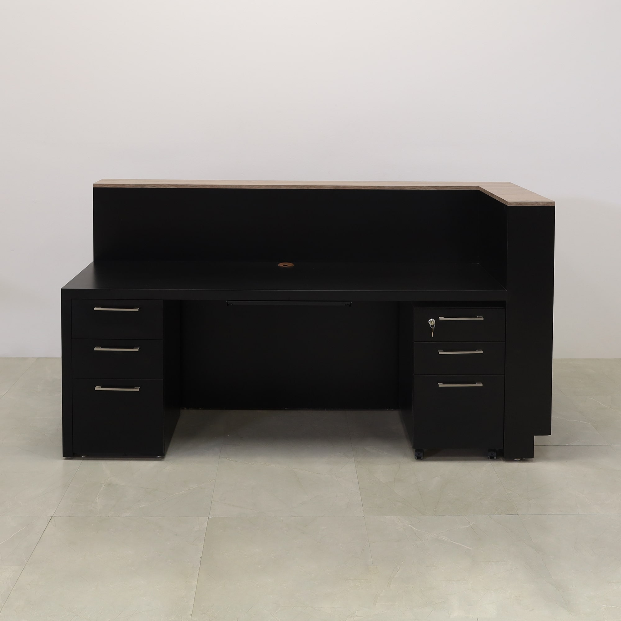 84-inch Manhattan L-Shape Custom Reception Desk in walnut heights matte laminate accent panel and top counter, and BLACK TRACELESS laminate main desk. Gold aluminum toe-kick, with multi-colored LED, shown here.
