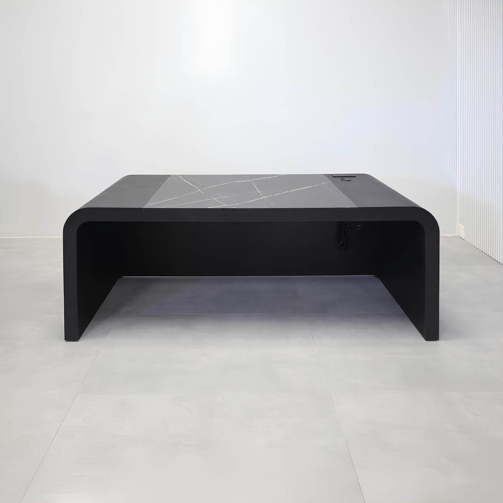 84-inch Milano Curved Executive Desk with Pietra Noir engineered surface top, Ebony wood veneer desk & panel, and Ebony tambour veneer privacy panel.