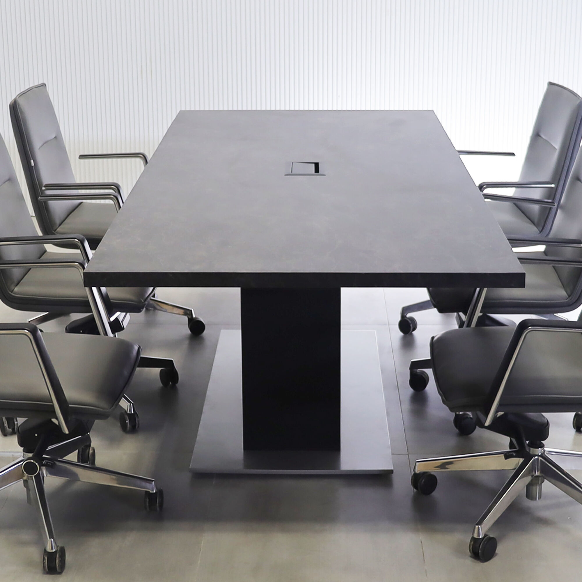 90-inch Aurora Rectangular Conference Table with black amani engineered surface top, black traceless laminate pedestal, metal powder coated silver base and black MX3 power box.