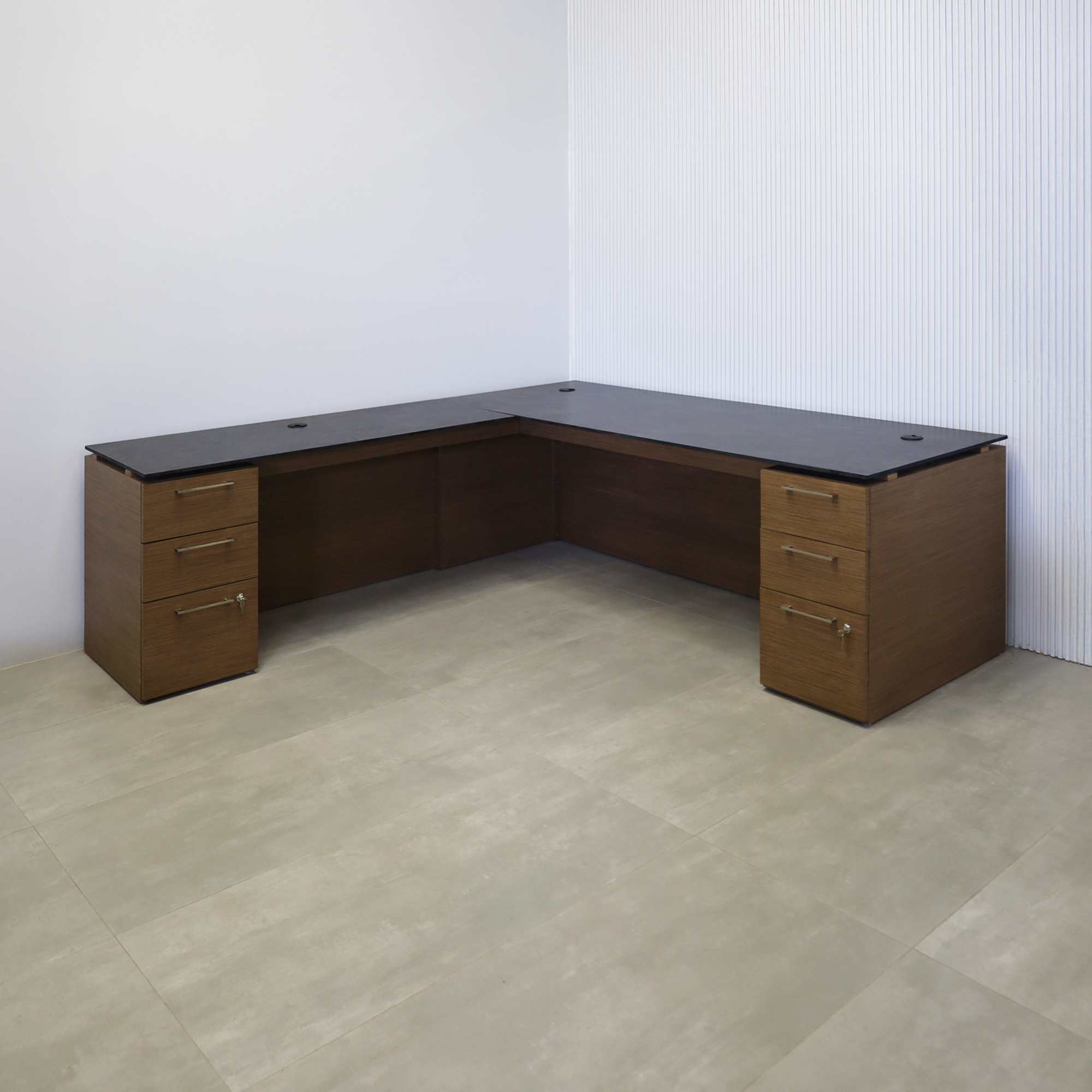 90-inch Denver L-Shape Executive Desk with Black Amani engineered surface top, Spiced Walnut wood veneer base and storage, and Spiced Walnut wood veneer panel.