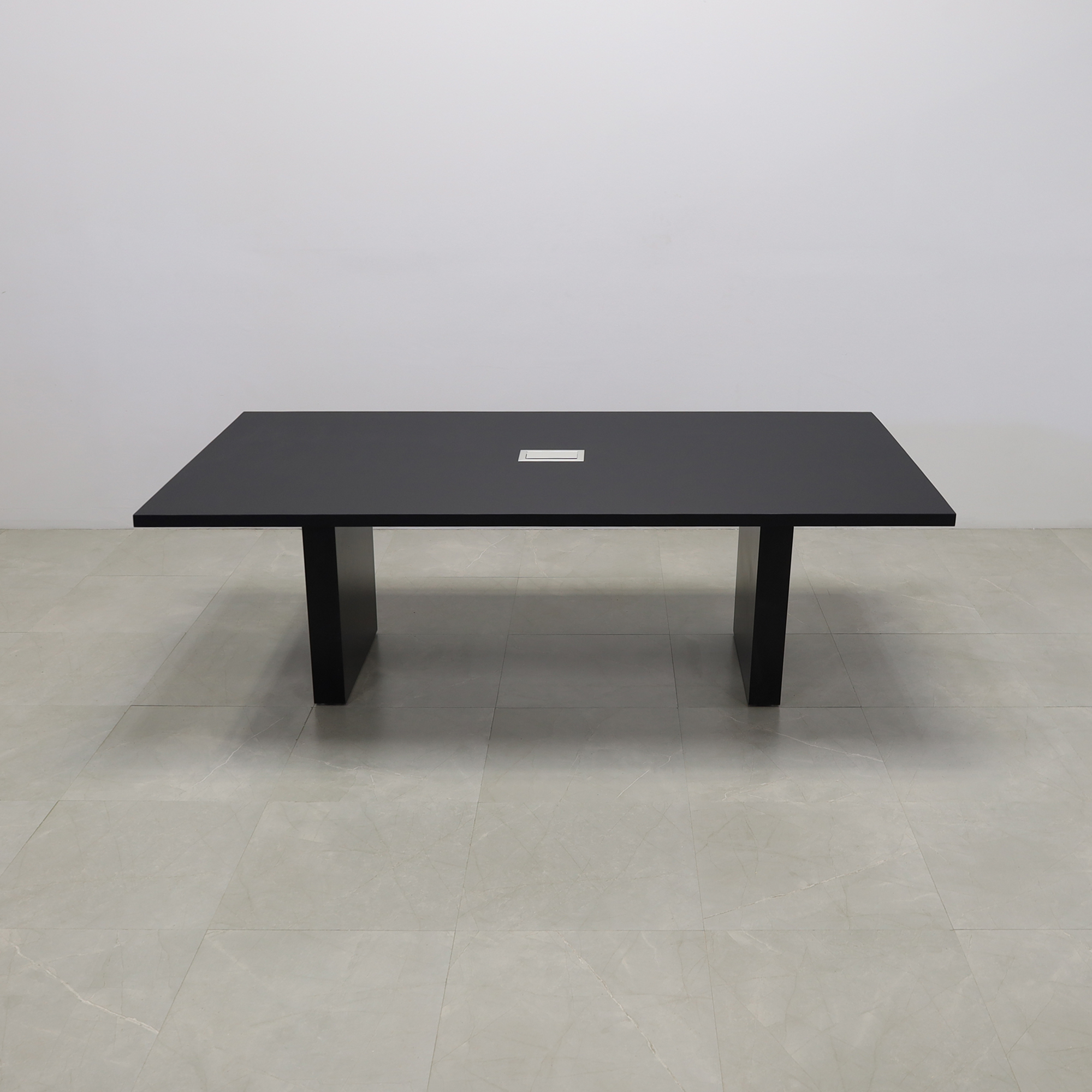 92 inches Newton Rectangular Conference Table in Black Traceless Laminate top and Black Matte Laminate base finish. Ellora power box, and six gray chairs shown here.