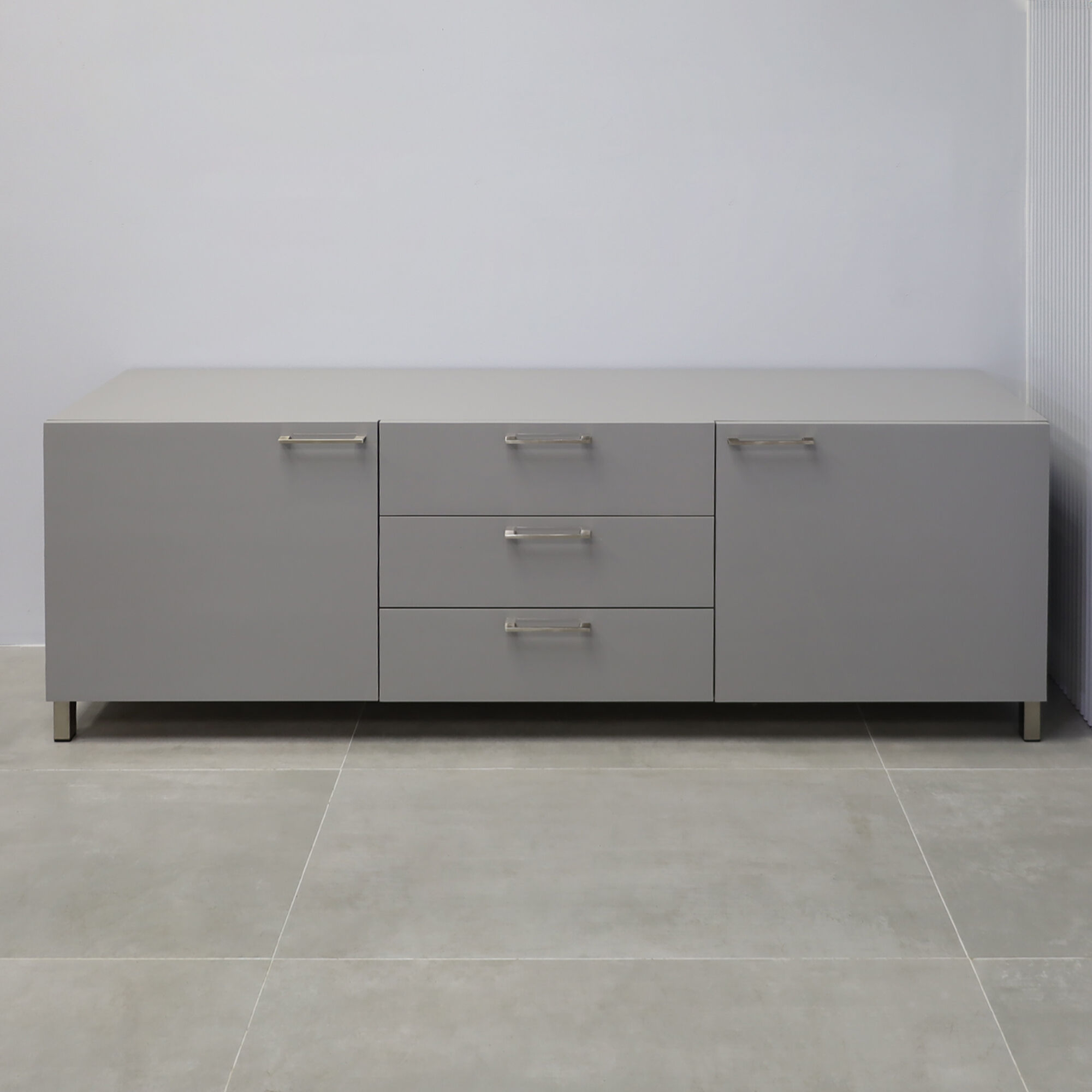 90-inch Naples Custom Storage Credenza in light gray gloss laminate credenza, and front drawers & doors, with chromed legs.