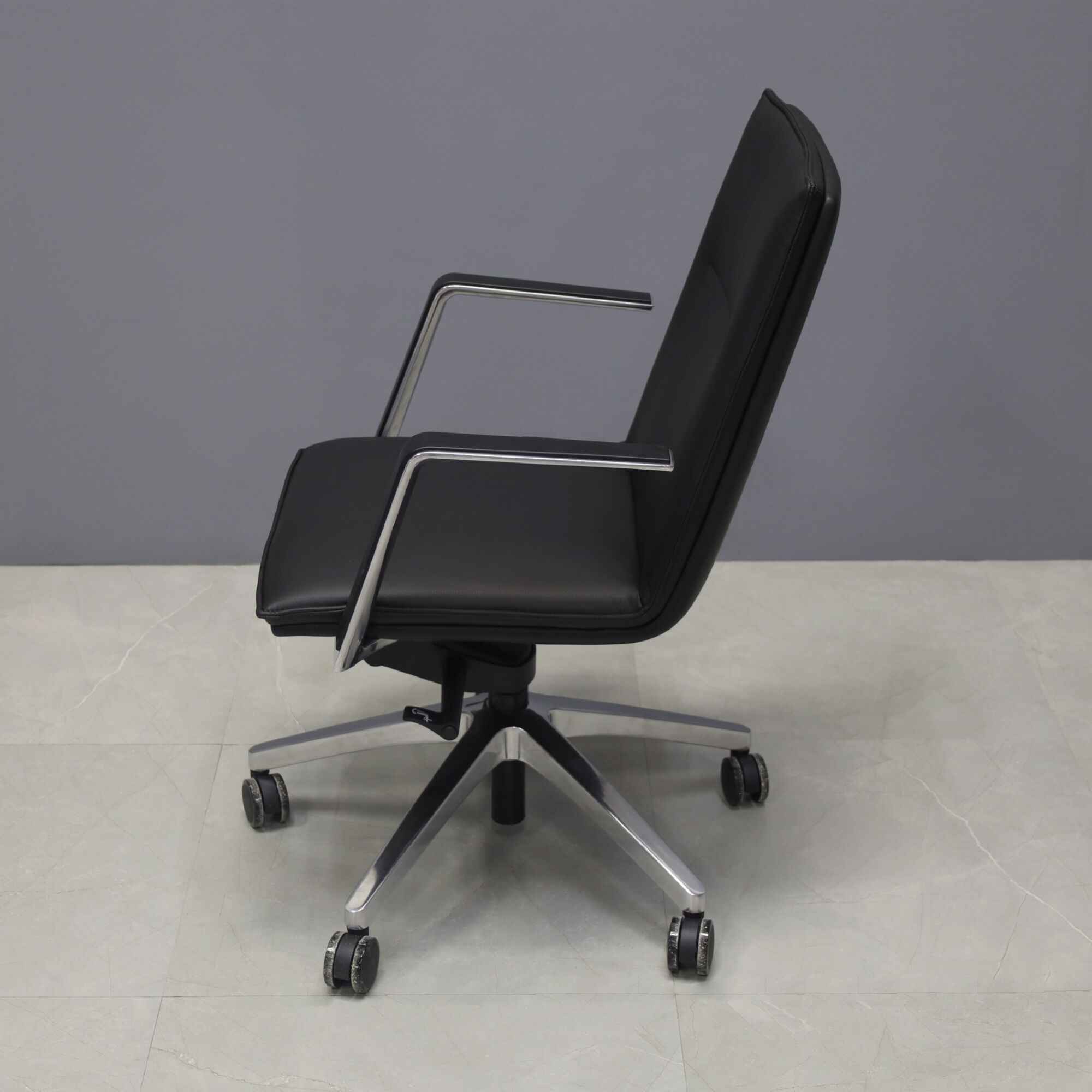 Casoni Conference and Task Chair in black upholstery, shown here.