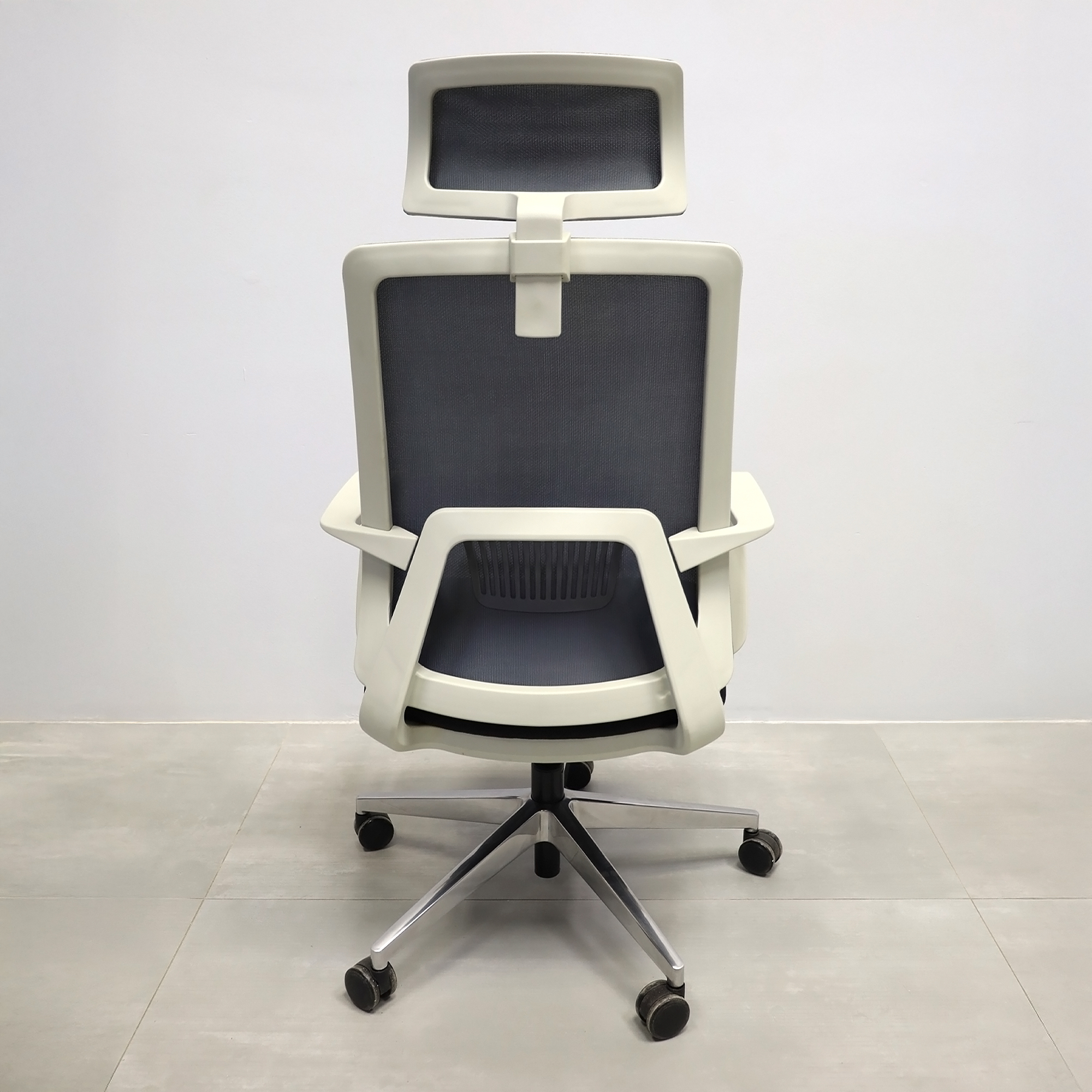 Terra Office Chair with Fixed Arms in light gray mesh back and black fabric seat cushion, shown here.