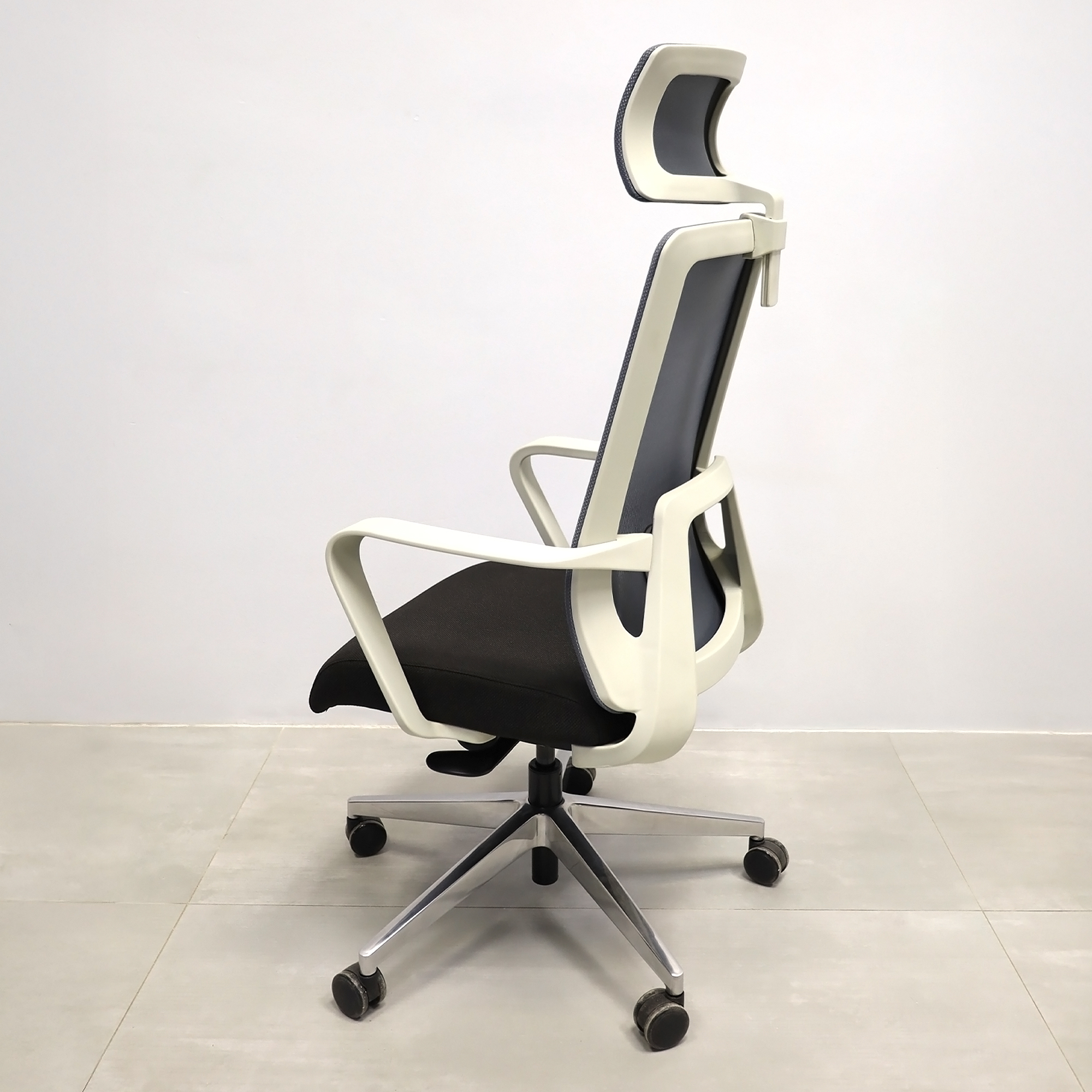Terra Office Chair with Fixed Arms in light gray mesh back and black fabric seat cushion, shown here.