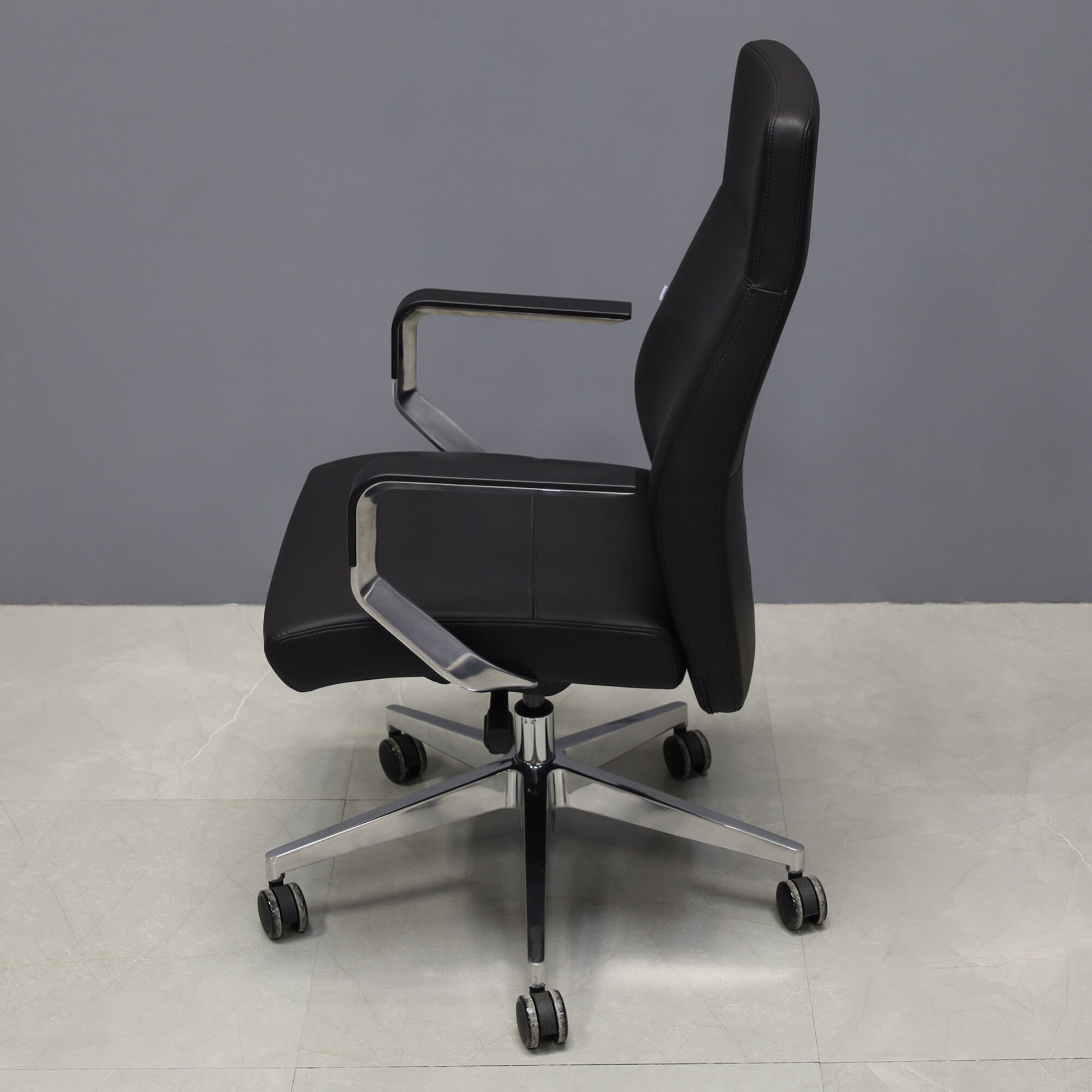 Tufino Conference and Task Chair in black upholstery, shown here.