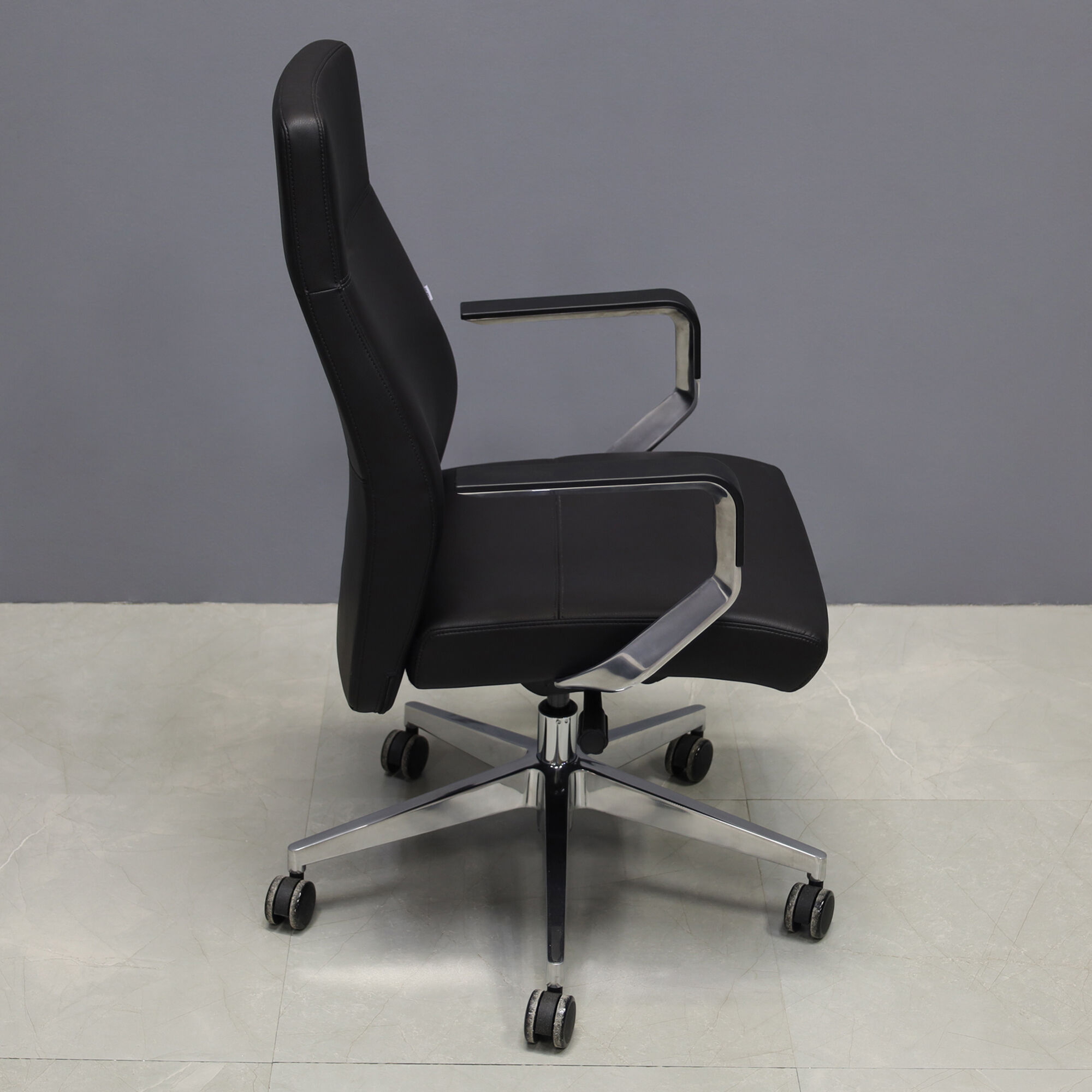 Tufino Conference and Task Chair in black upholstery, shown here.
