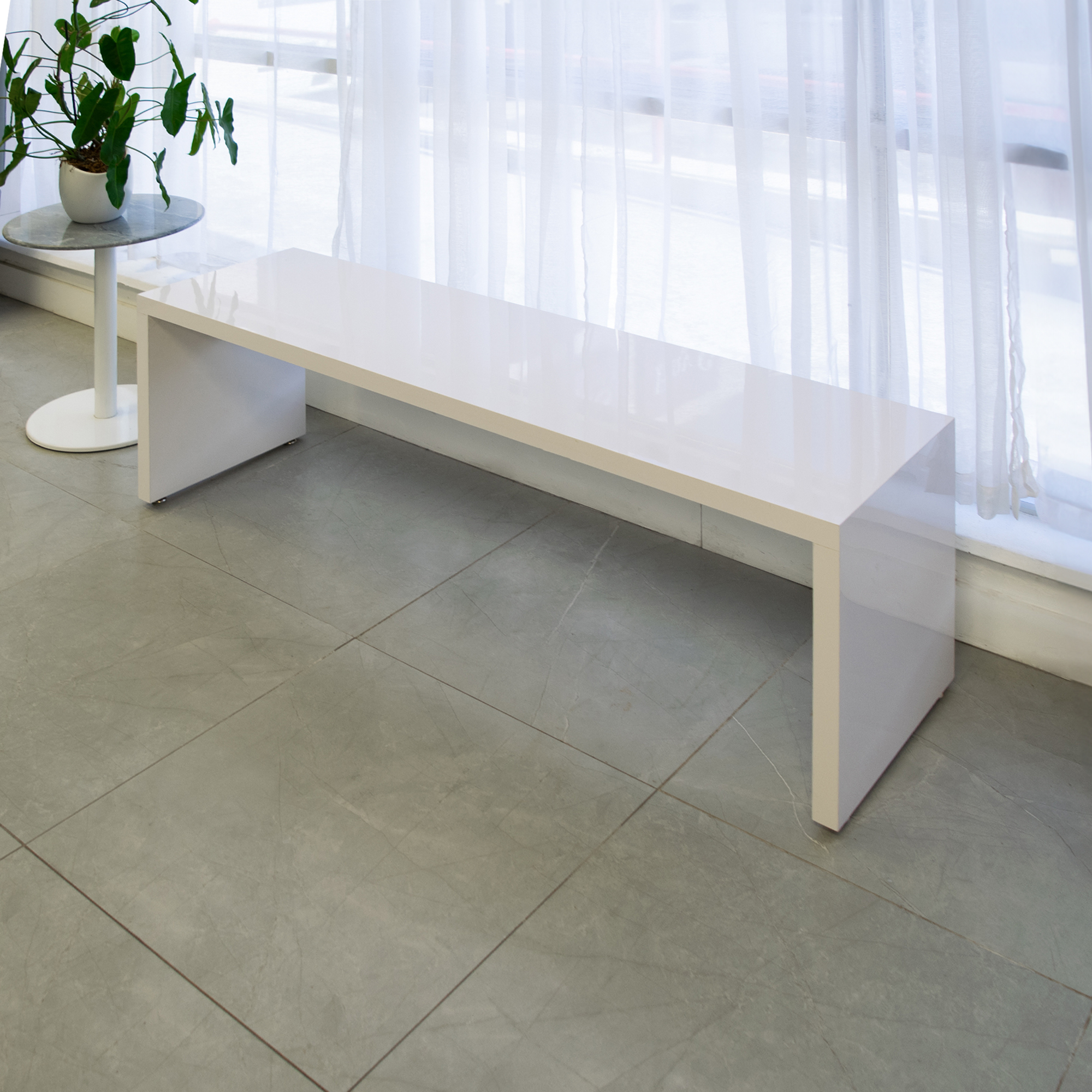 Astoria Bench in white gloss laminate finish shown here.